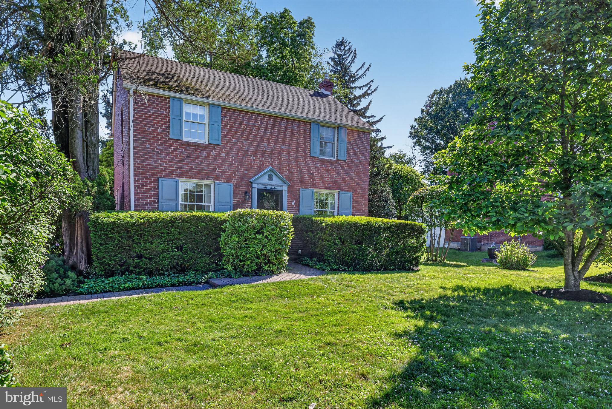 Welcome to 212 Idlewild Lane, a 3-bedroom, 2-bath brick Colonial in the acclaimed Rose Tree Media School District. Enjoy the perfect blend of charm and convenience just blocks from vibrant downtown Media, known for its restaurants, shopping, parades, community events, and small-town feel. Step inside to discover timeless character and 1800 square feet of living space, all lovingly maintained by the current owners for over 50 years. The home features a gorgeous sunroom with a cathedral ceiling and windows that flood the space with natural light and overlook the private backyard. The quaint kitchen, dining room, spacious living room and a convenient 2nd full bathroom complete the main level. The finished basement provides additional flexible living space for a family room, office, gym, or playroom. Upstairs you will find three bedrooms and a retro black and white tile bathroom, plus two hall closets and a cozy window nook on the landing. Major system updates offer peace of mind, including a new heater (2023), new central air and hot water heater (2021),  brand new dryer (2026) and a roof that is 10 years young. Outside, enjoy beautiful mature plantings and a deck perfect for outdoor entertaining or quiet evenings. The shared driveway and garage offer off-street parking for up to 3 vehicles. Commuters and those wanting an easy escape to Philadelphia will appreciate the proximity to the Rose Valley train station. Close to I-95, 476, and the airport. Don't miss the opportunity to make this gem your own!