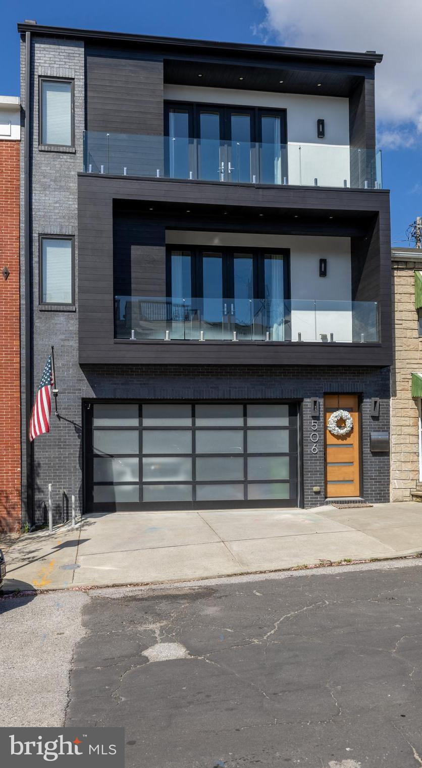 Welcome to 506 S Collington Avenue, a stunning luxury residence nestled in the heart of Canton—one of Baltimore City’s most sought-after waterfront communities. This exceptional home seamlessly blends sophisticated design, high-end finishes, and modern comfort, offering an elevated urban living experience.

From the moment you step inside, you’re greeted by an open-concept layout bathed in natural light, showcasing wide-plank hardwood flooring, soaring ceilings, and impeccable attention to detail throughout. The gourmet chef’s kitchen is a true showpiece, featuring premium stainless steel appliances, custom cabinetry, sleek quartz countertops, and an expansive island perfect for entertaining.

Upstairs, the spacious primary suite serves as a private retreat, complete with a spa-inspired ensuite bath boasting designer tilework, a glass-enclosed shower, and refined fixtures. Additional bedrooms offer generous space and flexibility, ideal for guests, a home office, or a personal gym.

One of the home’s most coveted features is the rooftop deck—your own private oasis with sweeping views of the city skyline and glimpses of the nearby waterfront. Whether hosting intimate gatherings or enjoying a quiet evening under the stars, this space delivers an unparalleled lifestyle.

Located just moments from the vibrant dining, shopping, and nightlife of Fells Point and the scenic waterfront promenade, this home offers the perfect blend of luxury and convenience. With easy access to major commuter routes and downtown Baltimore, 506 S Collington Avenue is the epitome of refined city living.