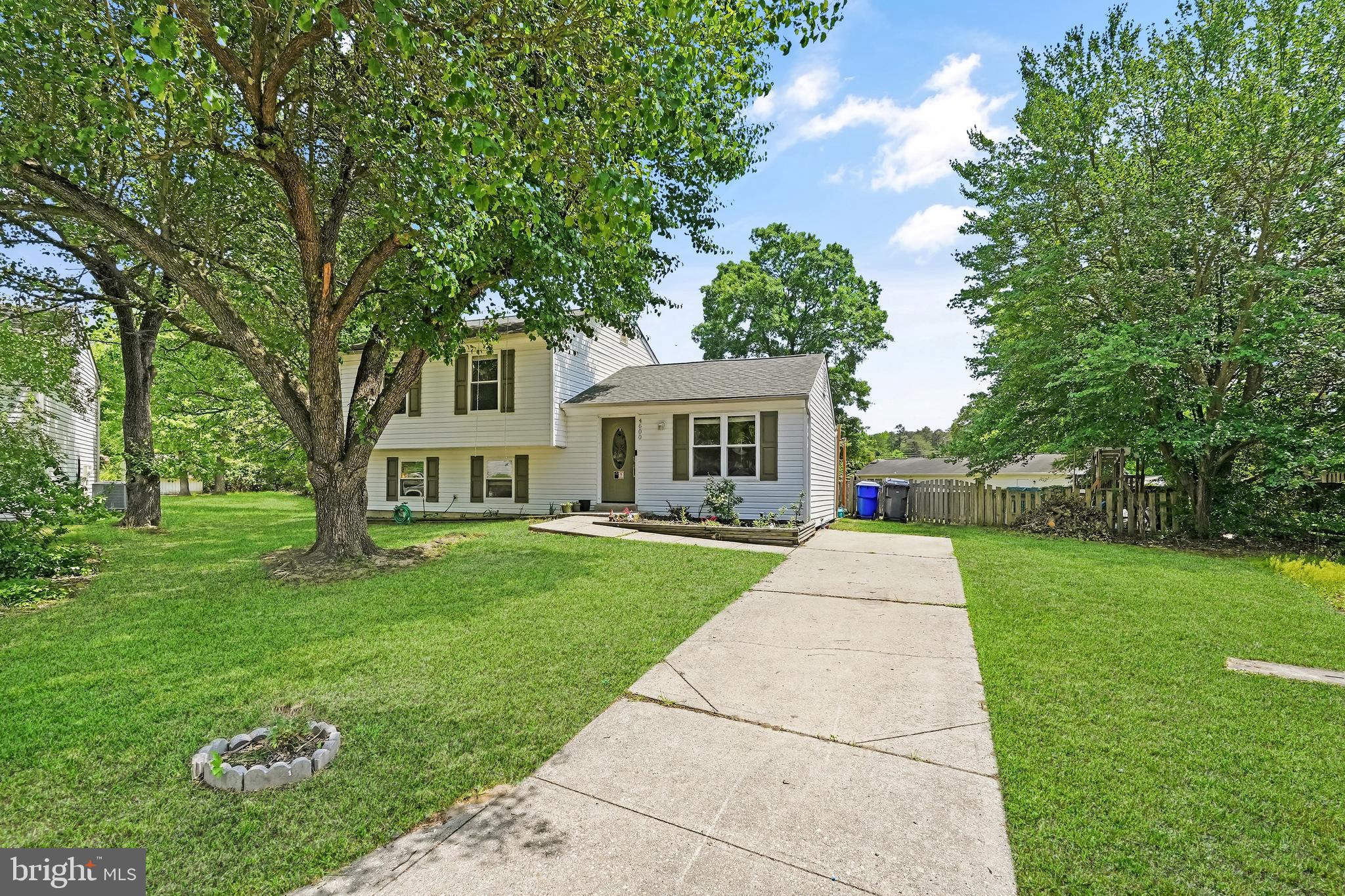Tucked away at the end of a quiet cul-de-sac, this home offers the perfect blend of comfort, space, and everyday functionality. This well-maintained split-level features an updated kitchen, spacious living areas, and a versatile floor plan designed to fit today’s lifestyle.

The upper level includes three generously sized bedrooms and a full bath, while the lower level provides additional living space with a cozy family room highlighted by a fireplace, an additional bedroom, full bath, and laundry area; ideal for guests, multi-generational living, or a private home office setup.

Step outside to enjoy the large, fully fenced backyard complete with a deck and storage shed, creating the perfect setting for entertaining, relaxing, or enjoying outdoor activities. Situated on a sizeable lot, this home combines privacy, convenience, and charm with easy access to shopping, dining, commuter routes, and local amenities.

Residents enjoy access to desirable community amenities including a neighborhood pool, playground, tennis and basketball courts, trails, and clubhouse available for private event rentals. The community fee also covers groundskeeping and maintenance of communal areas, helping preserve the neighborhood’s attractive and welcoming atmosphere.

Added peace of mind comes with a seller-paid Home Warranty. The warranty offers valuable benefits including wholesale club membership reimbursement up to $130, handyman reimbursement up to $100, and homeowners insurance deductible reimbursement up to $1,000 per year. The home also features a water softener system and a brand-new HVAC system. Assumable VA loan at 4.5% interest rate.

Welcome home to 4600 Taylor Court - where comfort, convenience, community, and exceptional value come together in the heart of Waldorf.