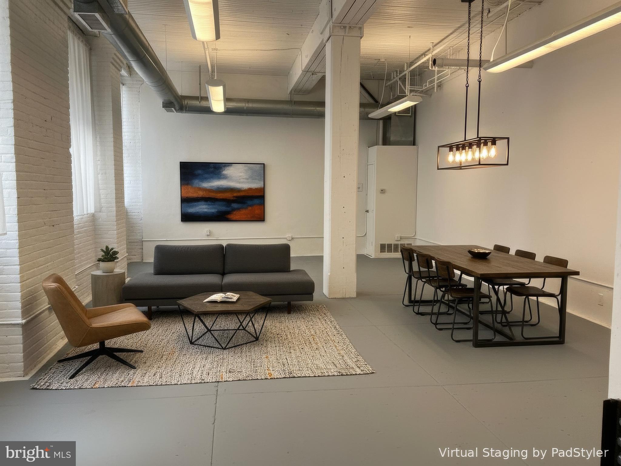 Tap into the energy of the Callowhill Loft District . The Rebman Building  is a Historic Industrial gem that was built  at the turn of the century in 1903 by Balinger & Perrot.  The Rebman Building is Located on N 13th St just south of Spring Garden.  This versatile space is great for artists, entrepreneurs, or anyone seeking an authentic urban studio. Features include a secure double-entry system, bright corner windows (North/West exposure), towering ceilings, an updated bath, and fresh paint throughout.  Features an area for Storage Closets .  With an open layout, it’s  move-in ready for your business, your home, or both. This Unique space has previously been used as office space and Artists Studios.  The Rebman Building is home to many Artists and those that appreciate Loft Living.   Walk to Giant Supermart, Fine wine & Spirits, Restaurants and more.  Easy access to Major Highways and Transportation.
Monthly Parking is available at 428 N 13th St.