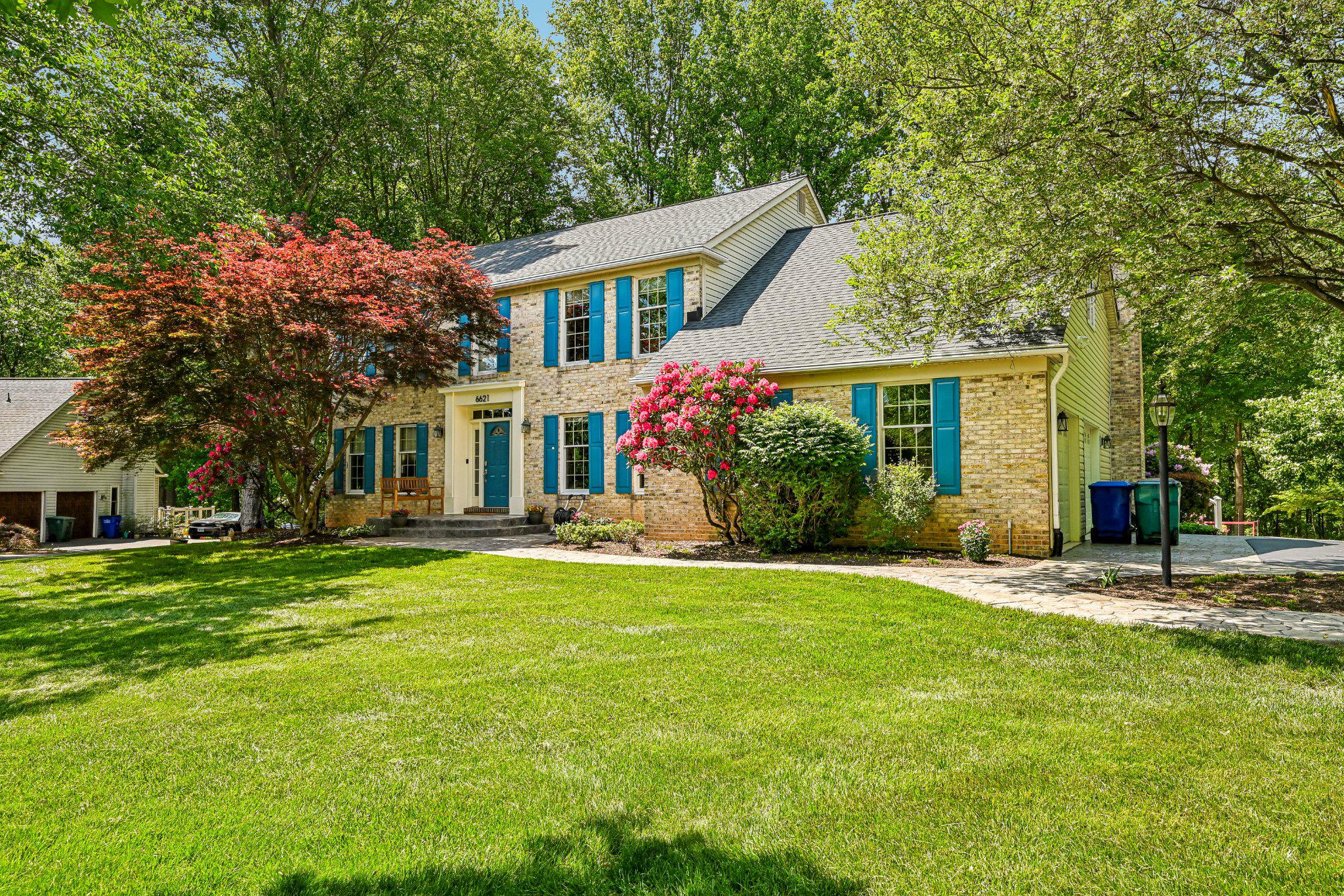 Nestled on a private 1.25-acre cul-de-sac lot backing to mature trees, this exceptional 5-bedroom, 3½-bath center hall colonial thoughtfully customized by the original owners from the earliest stages of construction offers the perfect balance of timeless elegance and advanced smart-home functionality. . 
Created with exceptional attention to detail, this remarkable home offers a noticeably larger and more expansive feel than similar floor plans within the community, thanks to a series of exclusive builder modifications found nowhere else in the neighborhood. Rare custom expansions include a sunroom on the main level, additional upper-level bedroom square footage, and soaring 10-foot basement ceilings—creating a uniquely spacious layout with exceptional flow and livability across all three finished levels.
A welcoming hardwood foyer opens through a pocket door to a beautifully appointed kitchen, featuring durable DuraCeramic flooring, seamlessly blending practicality with timeless style. Additional pocket doors separate the main-level office and laundry area, offering flexibility and privacy for modern living. The kitchen flows effortlessly into the oversized family room with a wood-burning fireplace and into the sunroom with vaulted ceiling, which 
opens to a rear deck enhanced with ambient lighting—ideal for entertaining or quiet evenings
outdoors.
Upstairs, four generously sized bedrooms and two full baths provide exceptional comfort and space. The luxurious primary suite serves as a true private retreat, featuring heated bathroom flooring, jetted soaking tub, and spa steam shower with automatic humidity-controlled high-capacity exhaust fan. The dedicated tankless water heater ensures that you will never run out of hot water while using your spa. A separate 100-amp subpanel services the suite’s extensive amenities.
The fully finished walkout basement is highlighted by 10-foot ceilings and large recreation spaces for homework stations, reading nooks, or a playroom. Designed for both entertaining and everyday living, the lower level features a partial kitchen, spacious family room with gas fireplace, bright sewing/craft studio, and direct access to a beautiful patio. A bedroom and a full bath with twin heat lamps offers enhanced comfort. The workshop is equipped with a shop bench, utility sink, padded flooring, under-stair storage, cabinetry, LED lighting, and robust 400-amp electrical service from the street—perfect for hobbyists, makers, or serious workshop needs. Outdoors, the property continues to impress. Situated in a cul-de-sac, the expansive yard backs up to parkland and Laytonsville Golf Course and includes a professionally lighted sand volleyball court, private firepit retreat, and large storage shed for lawn and recreational equipment. Surrounded by privacy while maintaining an open, airy feel, this remarkable property offers a rare combination of luxury, recreation, craftsmanship, and modern convenience. Additional highlights include perimeter security and extensive WiFi controlled smart home features and apps that provide both convenience and peace of mind. Call today to see if this exceptional home in the coveted Belle Chase community is the perfect fit for your family’s lifestyle.