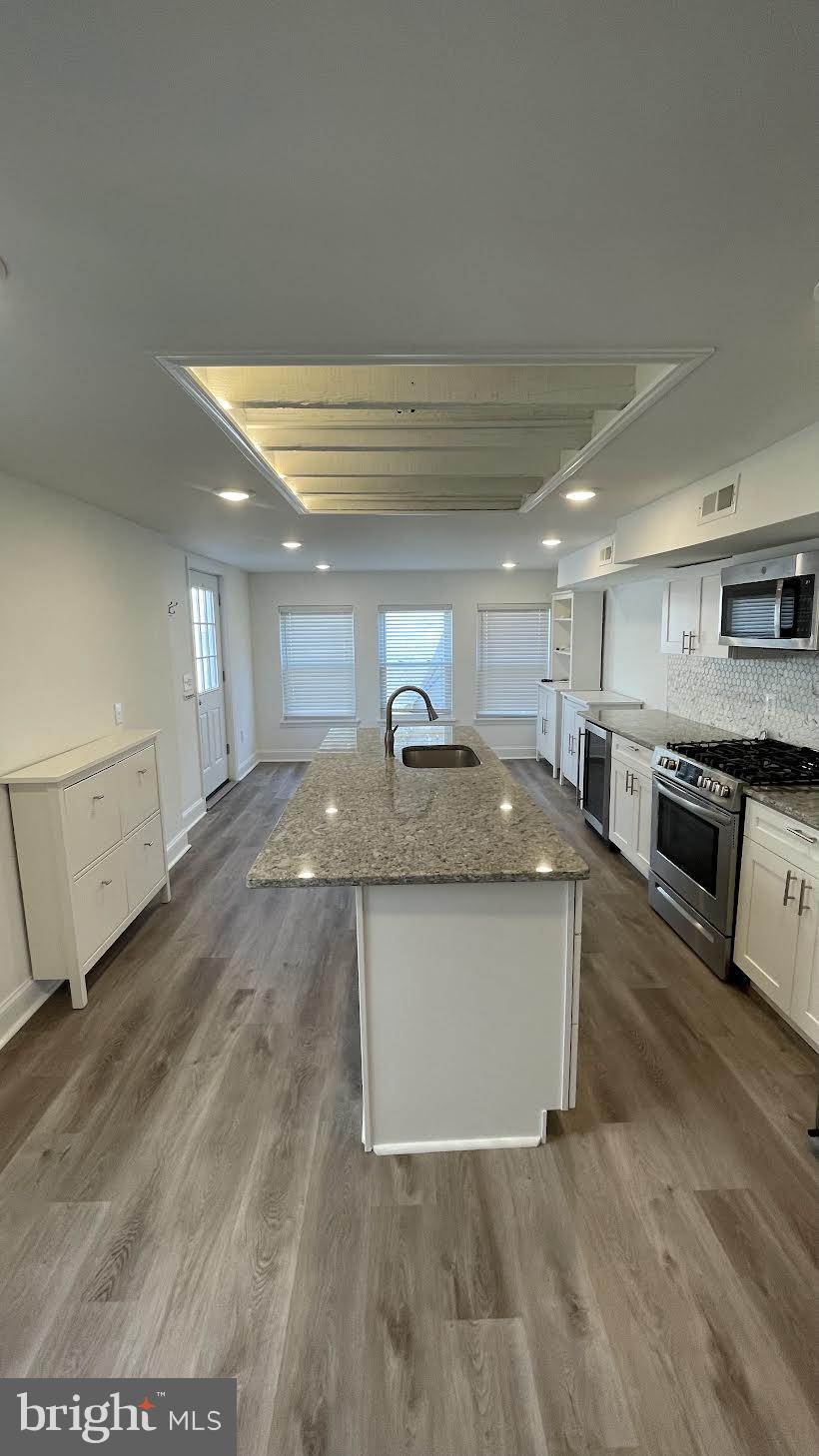 Welcome to this beautifully renovated 3-bedroom, 2-bathroom home in the heart of Conshohocken! Thoughtfully updated with modern finishes and a functional layout, this home checks all the boxes. The home features luxury vinyl flooring throughout, offering durability and a modern look across all levels. The updated kitchen is equipped with stainless steel appliances, a wine fridge, and flows right into a cozy living room—perfect for everyday living or entertaining.

A staircase leads down to the finished basement, offering additional living space, a full bathroom, and a dedicated laundry area.

Upstairs on the second floor, you’ll find two well-sized bedrooms and an updated full hall bath. The primary bedroom includes custom California Closet organizers for effortless storage. The third floor offers a private third bedroom—ideal as a guest space, office, or quiet retreat.

Outside, enjoy a fully fenced-in backyard (not shared) with a rear patio, perfect for hosting friends or relaxing outdoors.

Located just steps from Conshohocken’s vibrant shops, restaurants, and public transportation, this home offers walkability and convenience in one of the area’s most desirable neighborhoods. STOP BY THE OPEN HOUSE THIS WED, 4/09 FROM 6 - 8 PM.