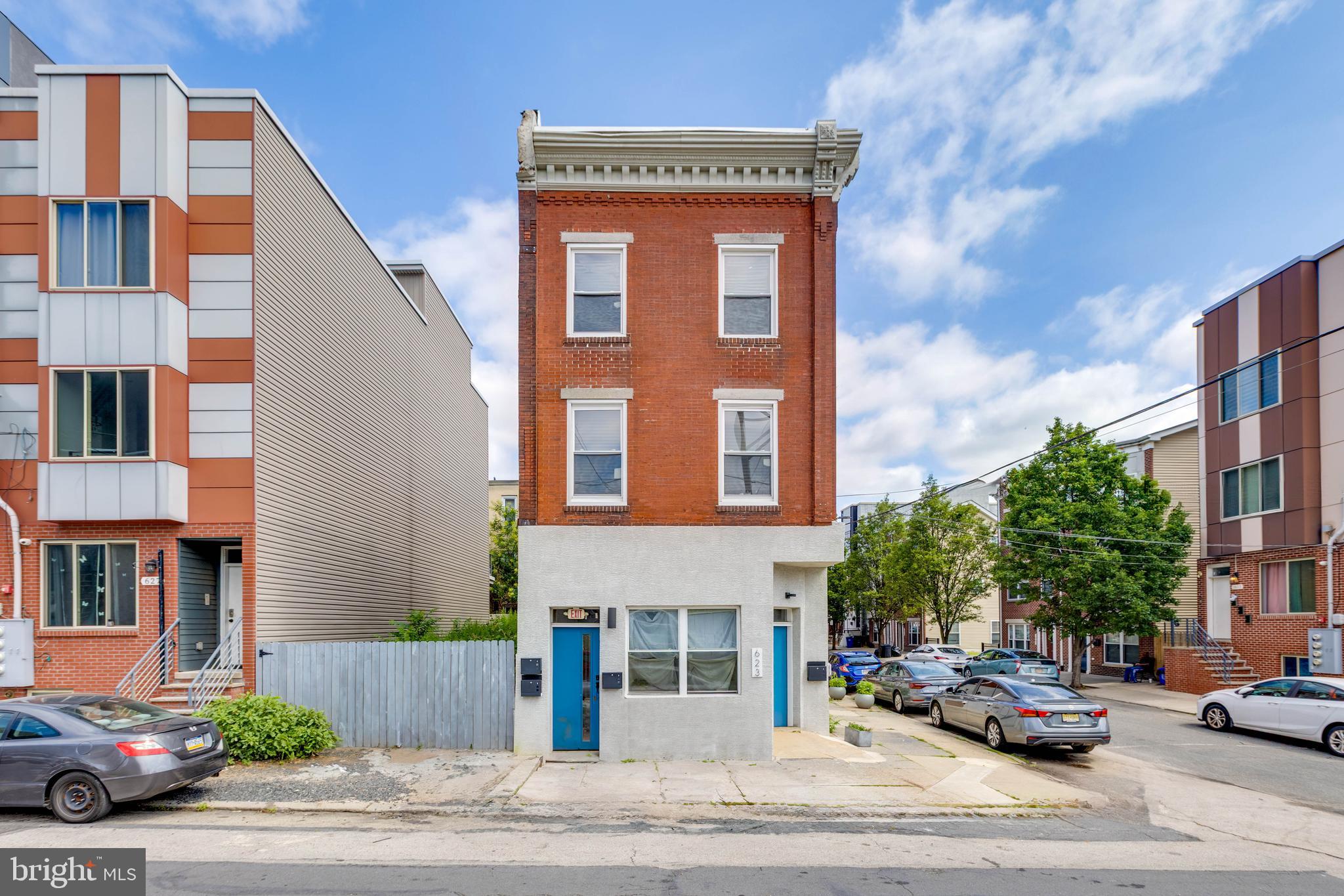 Unlock the Potential of 623 W Oxford Street - A Fully Renovated, MIXED-USE Investment Opportunity Positioned in one of Philadelphia’s most accessible and vibrant neighborhoods—just minutes from Fishtown, Temple University, and Northern Liberties—623 W Oxford Street presents a rare opportunity to own a fully renovated, income-generating 4-UNIT PROPERTY with exceptional versatility. Zoned for both residential and commercial use, the building’s first floor offers a spacious 2-bedroom, 1-bath unit with a dedicated entrance, private backyard, in-unit laundry, and access to basement storage. With a layout that provides excellent separation and privacy, this unit is ideally suited for a storefront, office, or live/work setup. The second level features two well-appointed 1-bedroom, 1-bath units. Each offers a clean, contemporary design with recessed and pendant lighting, gray shaker cabinetry, quartz countertops, and efficient layouts—making them highly appealing to tenants and easy to manage. The third floor hosts a full 2-bedroom, 1-bath unit that mirrors the modern finishes found throughout the building, complete with in-unit laundry and abundant natural light. Every unit is separately metered, and the property underwent a comprehensive renovation just two years ago. Upgrades include a new roof, all-new kitchens and bathrooms, updated lighting, and refreshed mechanicals—ensuring a low-maintenance ownership experience. Located steps from neighborhood favorites such as Grocery Outlet, Bean2Bean Coffee, and Human Robot Brewing, this walkable and transit-friendly location adds further appeal for both residents and businesses. Whether you're an investor seeking multiple rental income streams, a homeowner interested in offsetting your mortgage with tenant income, or a business owner in need of a flexible live/work environment, 623 W Oxford Street delivers unmatched value and opportunity.