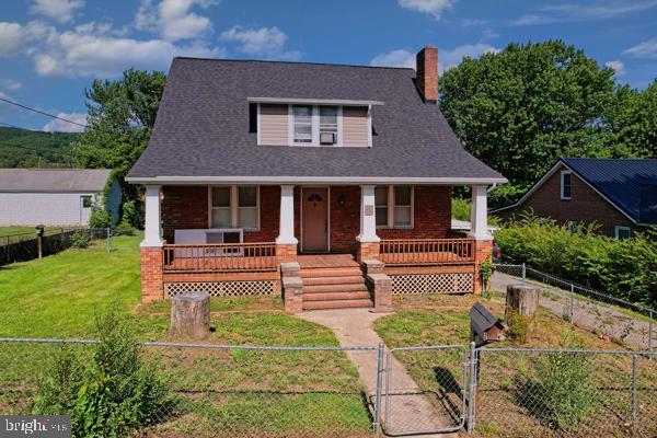 They don't make them like this anymore! This 1945 home has all the things you want in a home and is built to last! This beautiful brick cape cod home has 4 bedrooms, one on the main level, and 1.5 bathrooms. Real hardwood floors, with tile and laminate to mix it up a bit. The old radiators have been removed and mini splits have been added for that extra comfort we all long for. The wood stove insert in the fireplace gives you a nice view of the fire without all the backdraft and mess. On top of all that the location is amazing! Walking distance to school, shops, restaurants and the new down town pavilion. Family weekends have never been more fun and accessible!