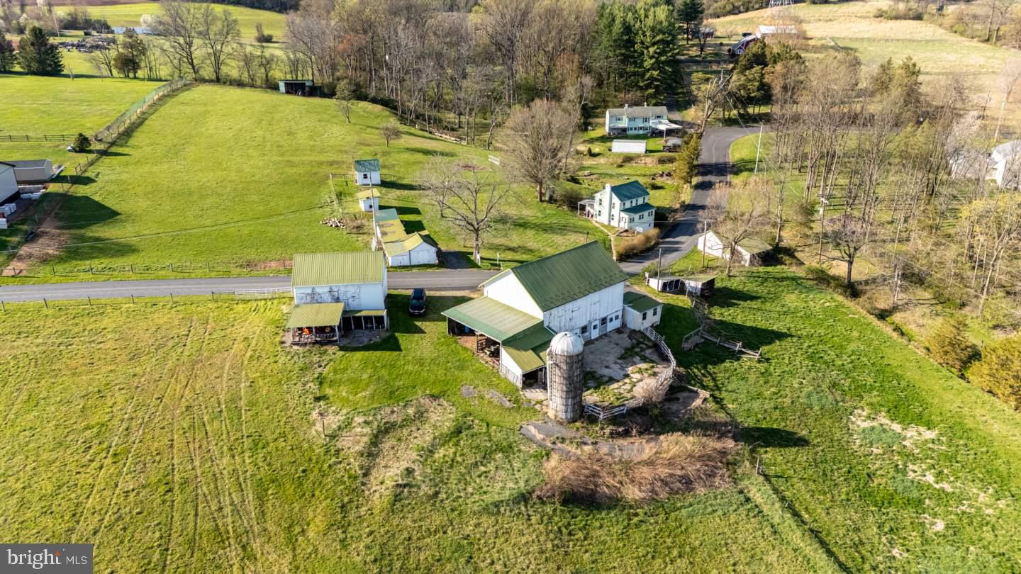 This property is being offered for sale at auction on Friday June 12, 2026 at 6:00 PM. List price is the suggested opening bid only and is not indicative of the final sale price.

REAL ESTATE:  28.4-acre farm featuring a 2-story farmhouse with 1,190 SF of living space. Main level offers a kitchen with electric range, family room with brick hearth and wood stove, half bath, dining room with wood floors, living room, and sun porch with washer/dryer hookup. Upstairs includes 2 bedrooms, full bath, and attic access. Daylight basement with stone floor, outside entrance, oil hot water baseboard heat, on-site well and septic. Outbuildings: 32×46 stone & frame bank barn with 21 cow stanchions and equipment lean-to; 22×32 1½-story equipment shed with corn crib, calf stanchions, and holding pen; 15×24 equipment shed with lean-to; 14×16 block milk house; 45’ run-in shed; multiple storage sheds; stave silo; chicken coops; shop; and stone spring house. Land: Mostly tillable, enclosed with high-tensile fencing, and a creek running through the property. Zoned RR, enrolled in Clean and Green and Agricultural Preservation.
NOTE:  This scenic farm is a hobby farmer’s or homesteader’s paradise! Quiet and peaceful, surrounded by gorgeous views of farmland and mountains it is the perfect place for animals with a stream running right through the middle . The property also offers mostly tillable land for growing crops. 
OPEN HOUSE:  Saturday, May 23, 30 & June 6 (1-3 pm.) or anytime by apt.                                                    
TERMS:  10% down day of sale; settlement within 45 days of sale.  Attorneys Glick, Goodley, Deibler & Fanning LLP. 
TERMS BY:  Earl A. Leininger Estate.