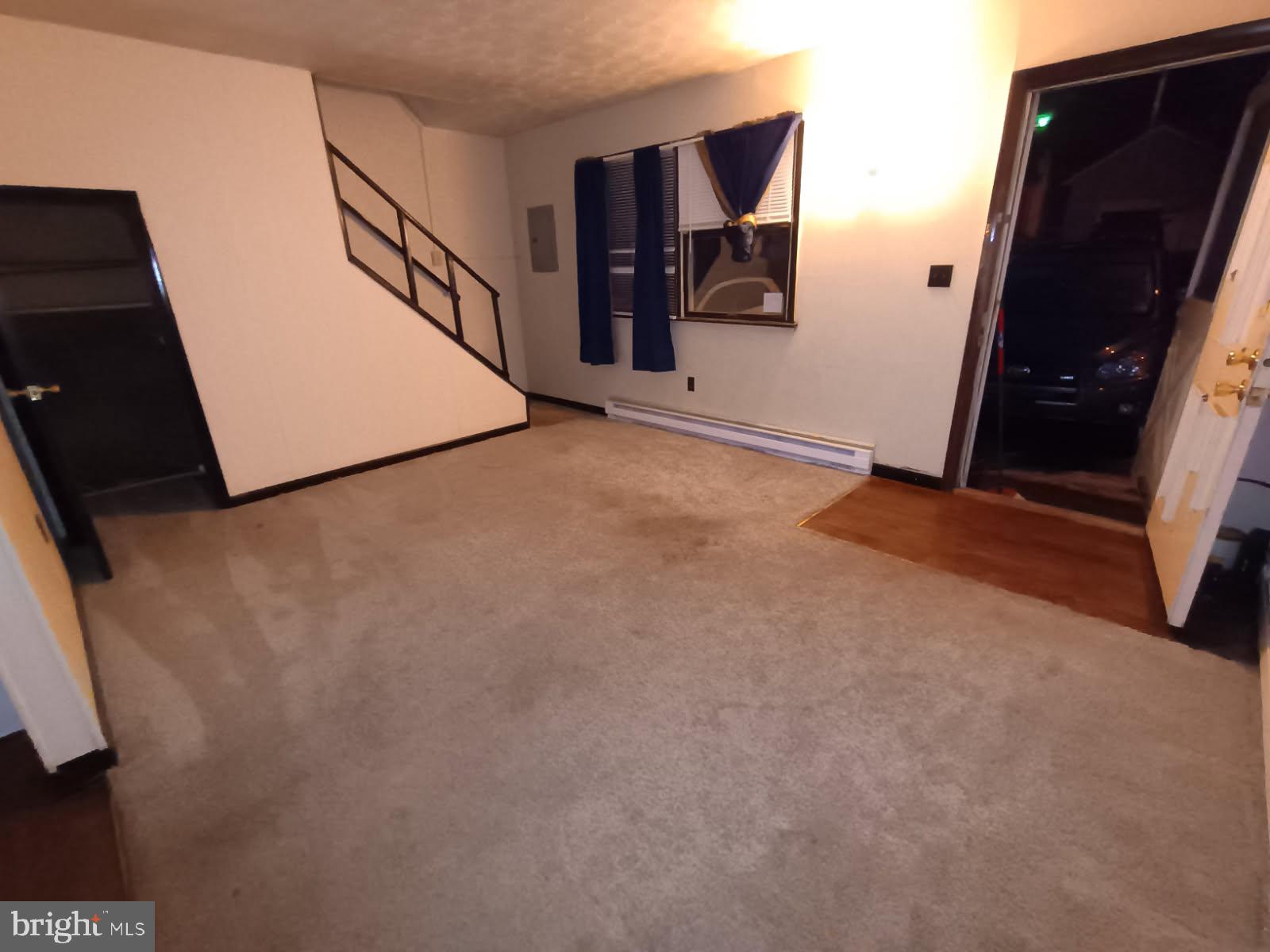 Two bedroom, one bath apartment with ground floor entry, and off street parking.