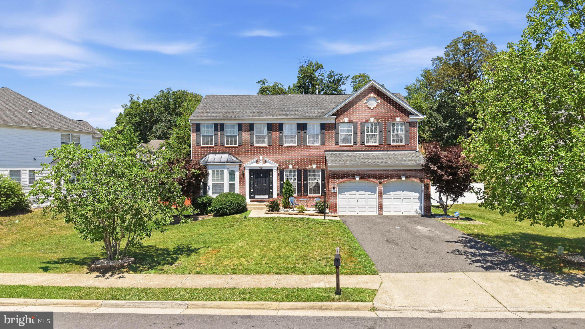 This stunning Delaware model Hovnanian home with 4 Bedrooms upstairs and 3 bonus rooms in the full finished basement with kitchenet is located in the highly desirable Eagles Pointe subdivision. With its charming all brick front and beautifully landscaped yard, this home exudes curb appeal. The main level boasts an open-concept layout, featuring a living room, dining room, private office, a full bathroom, and a spacious two-story family room with a fireplace. The large kitchen has an open layout with ample storage and counter space, a center island, and gorgeous granite countertops. Adjacent to the kitchen is a bright and airy sunroom, perfect for enjoying meals or relaxing. The sunroom leads to a large deck which is perfect for a BBQ with family and friends. The almost flat, huge backyard serves as a beautiful backdrop for the home. Upstairs, you'll find four generously sized bedrooms with a well-designed layout. The primary suite is a true retreat, complete with an adjacent dressing or sitting area, a walk-in closet, and an en-suite bathroom featuring a soaking tub, walk-in shower, and dual vanities. The upper-level laundry offers the much-needed ease and convenience of it. The finished walk-up lower level offers additional living space, including a spacious rec room, a versatile 3 room that can be used as a theater room or flex space, and a full bathroom. The HVAC system was also replaced in 2022, ensuring year-round comfort. Residents of Eagles Pointe have access to a range of amenities, including an elegant community center with meeting spaces, a fitness center, dining room, and game room. The community also features a well-maintained pool, playgrounds, and sports courts. Conveniently located near schools, shopping centers, Quantico, commuter routes, and VRE stations, this home offers both comfort and convenience. Don't miss your chance to make it yours!