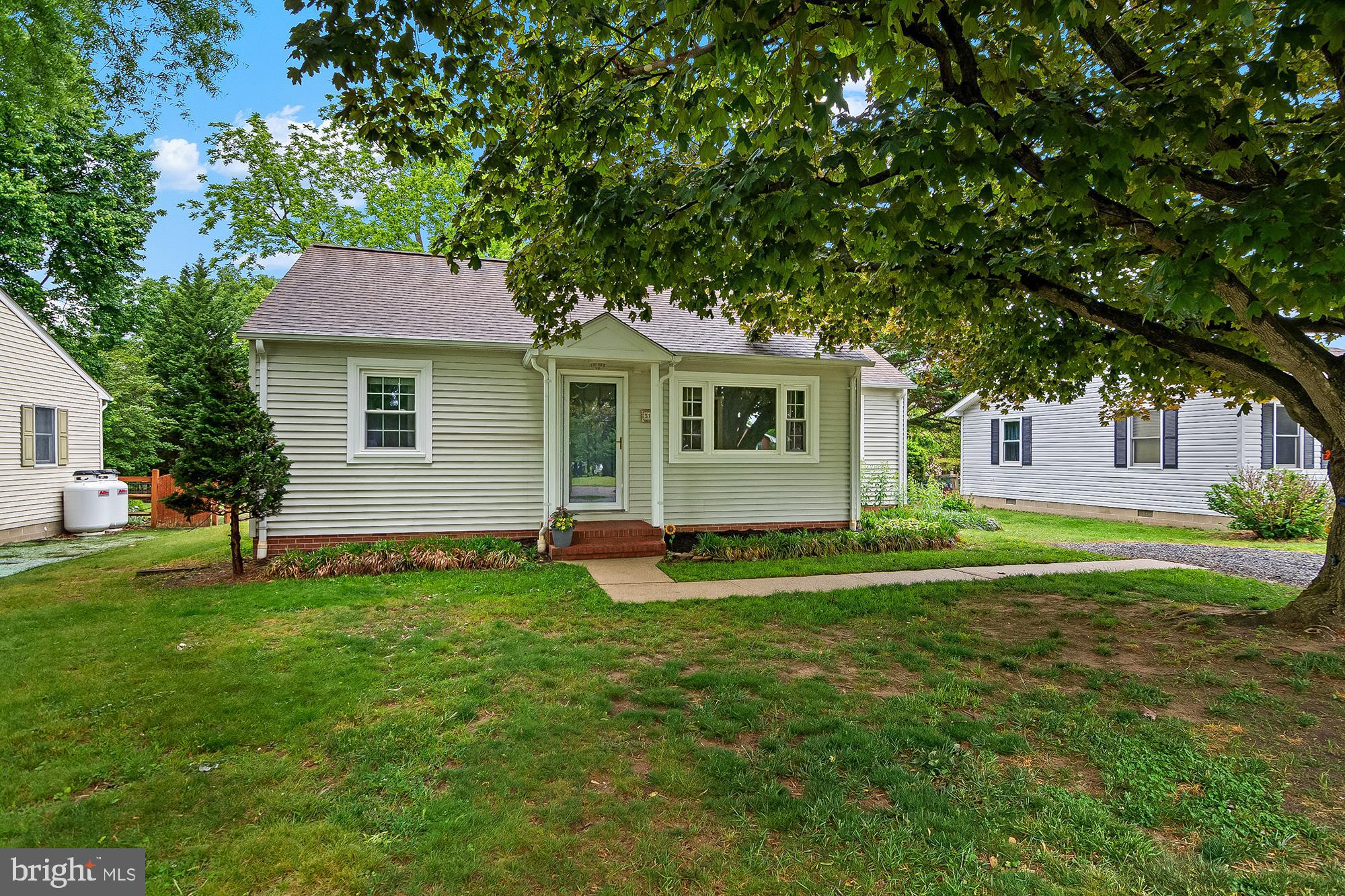 Discover the charm of this delightful bungalow nestled in the heart of Centreville Heights. This beautifully maintained 2-bedroom, 1-bathroom home boasts hardwood floors that flow seamlessly throughout, creating a warm and inviting atmosphere. The eat-in kitchen is perfect for those early morning coffees or evening cocktails, including a cooktop, wall oven, dishwasher, and refrigerator, perfect for culinary enthusiasts. Step outside to enjoy your private deck, ideal for enjoy those beatiful mornings or evening gatherings. The spacious lot offers ample outdoor space, complemented by street lights that enhance the neighborhood's inviting ambiance. A convenient shed provides additional storage for your gardening tools or outdoor equipment. The interior features include an attic for extra storage, a cozy dining area, and energy-efficient double-hung windows that fill the home with natural light. The basement, equipped with a drainage system and sump pump, offers potential for additional living space or a workshop. Located in a vibrant community, this home is just minutes away from local parks, providing endless opportunities for outdoor activities and relaxation. The neighborhood is known for its friendly atmosphere and accessibility to essential public services. This property is not just a house; it's a place to create lasting memories. Embrace the lifestyle you've always wanted in Centreville Heights!