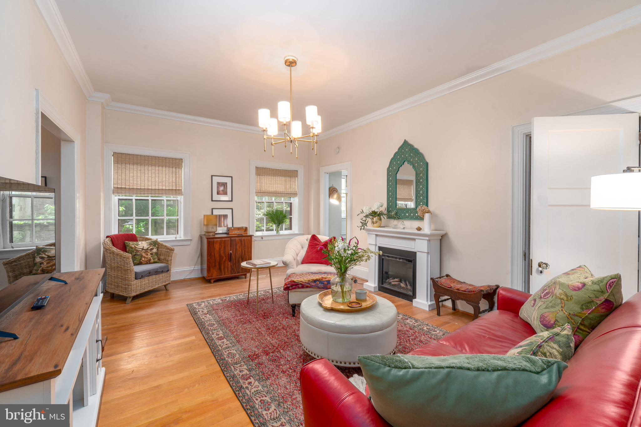 Tucked into one of Baltimore’s most beloved and architecturally rich enclaves, this rare residence at 230 Stony Run Lane offers a lifestyle that feels worlds away from the city, while keeping everything you love within easy reach. Set among mature trees, winding paths, and timeless courtyard buildings, Unit 4G blends old-world charm with the ease of condo living in the coveted Gardens of Guilford/Tuscany-Canterbury corridor.

Inside, sunlight pours through oversized windows and highlights warm hardwood floors, gracious room proportions, and a floor plan that lives like a home rather than a typical apartment. The expansive living room is equal parts refined and comfortable, anchored by a fireplace and framed by treetop views. A true dining room invites dinner parties, holiday gatherings, or slow Sunday brunches. The large kitchen offers generous workspace, everyday dining potential, and rare in-unit laundry. A flexible bonus room creates the ideal office, studio, reading retreat, or guest overflow space.

The bedrooms are privately positioned and generously scaled, creating a quiet retreat from the main living areas. Every room carries a sense of calm, character, and thoughtful function.

What makes this home truly special is the life beyond the walls. Morning walks along Stony Run Trail. Coffee in Roland Park. Evenings at local favorites on Charles Street. Easy access to Johns Hopkins, Loyola, Notre Dame, The Rotunda, Hampden, and downtown. This is the kind of neighborhood people move to and stay for decades because it simply feels good to live here.

For the buyer who values beauty, serenity, space, and location, Unit 4G is more than a home. It is a daily lifestyle upgrade in one of Baltimore’s most enduring settings.