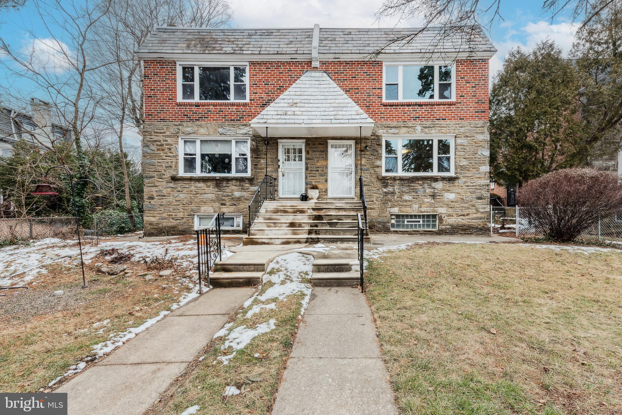 Welcome to 617 E. Durham Street in East Mt. Airy! This is a lovely, light-filled 4-bed/2.5-bath duplex that has just been carefully renovated (2024). Each unit has 2 beds/1 bath, beautiful original parquet floors that have been cleaned and refinished, a spacious living room, an eat-in-kitchen with adjoining dining room area, plenty of closet space, and an attached garage with space for 1 car (can be accessed from either the basement level or the rear of the house). [PLEASE NOTE: 617 E. Durham is the duplex on the right hand side of the first 3 photos. Photos of both 1st Floor and 2nd Floor Units are included in the listing -- they are not duplicates of the same photos.]

Each unit has a brand new kitchen with granite countertops, soft-close white Shaker cabinets, stainless steel Frigidaire appliances (refrigerator, dishwasher, built-in microwave, 5-burner gas oven/stove), disposal, under cabinet lighting, and luxury vinyl plank flooring. The brand new bathrooms have tile floors, American Standard shower tubs with subway tile surround (with built-in niche) and Carrara marble shelves, Carrara marble thresholds, brushed nickel fixtures, high hat lighting, vanities, and wall-mounted mirrors with medicine cabinets.

In addition to the updates mentioned above, many other upgrades have been made, including: fresh paint throughout, new brick pointing, a new fibered aluminum seal coat and resealed flashings on the roof, new doors, new locks, new double hung windows, new lighting throughout, 2 new hot water heaters, 1 new Crown Aruba boiler, new slate tile flooring (vestibule), most of the baseboard/trim throughout is new, and new concrete steps in the rear.

The house has a full basement with W/D hookups, a renovated half bath (new toilet, flooring, and lighting), an unfinished section with all of the mechanicals, and a large finished common room with new carpeting that leads to both of the separate attached garages.

There is a grassy front yard with tall, mature trees, as well as a backyard and driveway with access to both of the attached garages and to the easement that leads to Stenton Avenue!

This is the perfect home for an investor client or for someone who wants to live in one unit and rent out the other! What are you waiting for? Come and see this lovingly renovated duplex before it flies off the market!