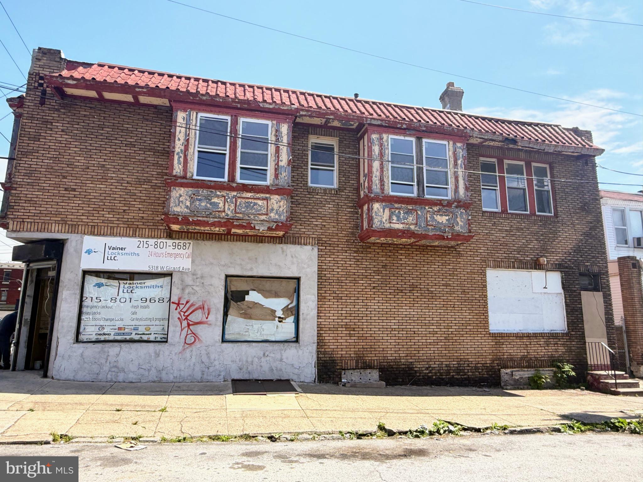 5318 W Girard Ave presents a rare mixed-use value-add opportunity in the heart of West Philadelphia. Situated on a prominent corner lot with CMX-2 zoning, this end-of-block property offers exceptional visibility, flexible use potential, and strong upside for investors or owner-occupants looking to reposition an income-producing asset.  The property features a commercial storefront on the first floor with an open layout, expansive frontage, and excellent exposure along Girard Avenue. Above, the spacious second-floor residential unit offers 2 bedrooms and 1 full bathroom with generously sized rooms, oversized windows, abundant natural light, and original hardwood flooring throughout.  Additional highlights include multiple access points and a full basement with high ceilings, interior and exterior access, and ample space for storage, utilities, or future value-add opportunities.  The property is being sold as-is and requires a full renovation, including visible interior and mechanical updates, making it an ideal project for investors seeking to customize and maximize potential. No electricity on site. Daytime showings only.

Estimated post-renovation rental potential based on area comparables (buyer to verify):
Residential Unit (2BR): approximately $1,300/month
Commercial Space: approximately $1,550/month
Estimated Gross Annual Income: approximately $34,200/year