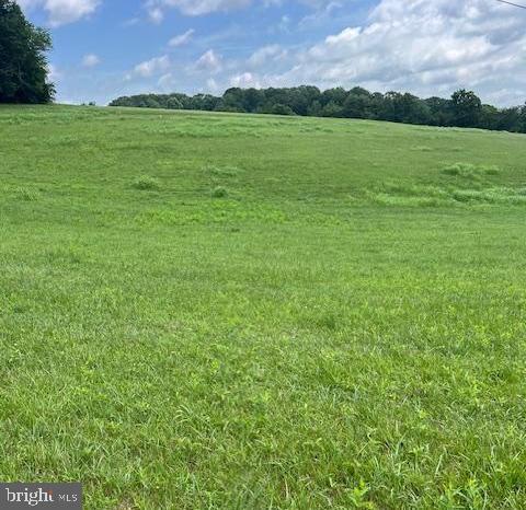 Gorgeous (if a lot can actually be gorgeous!) 2.5 acre lot in the Hereford Zone and ready to build!! Perc's finished and current. Well installed and it is a gusher at 12 gallons per minute and 200' deep. See reports in BRIGHT associated doc's. Pastural views from this slightly rolling lot set up to easily accommodate a walk-out lower level. Property is located in the Hereford Zone with Prettyboy Elementary, Hereford Middle and Hereford High Schools servicing this address. 28 minutes to Towson. 25 minutes to York, Pa. 15 minutes from churches, and the shopping mecca in Shrewsbury. Builder tie-in with builder-SKY KING PROPERTIES, LLC- Bring your own plans or choose plans provided by the builder. Shared driveway will be paved after home construction at builders cost. There is a recorded driveway use and maintenance agreement in place. Note tax assessment and annual taxes are for unimproved lot ONLY. No tax details available until new house is built and assessed. See MLS # MDBC2151326 for sample TO-BE-BUILT residence for this property. Buyer can choose own plans or select others offered by this builder. The proposed home is a sample ONLY.