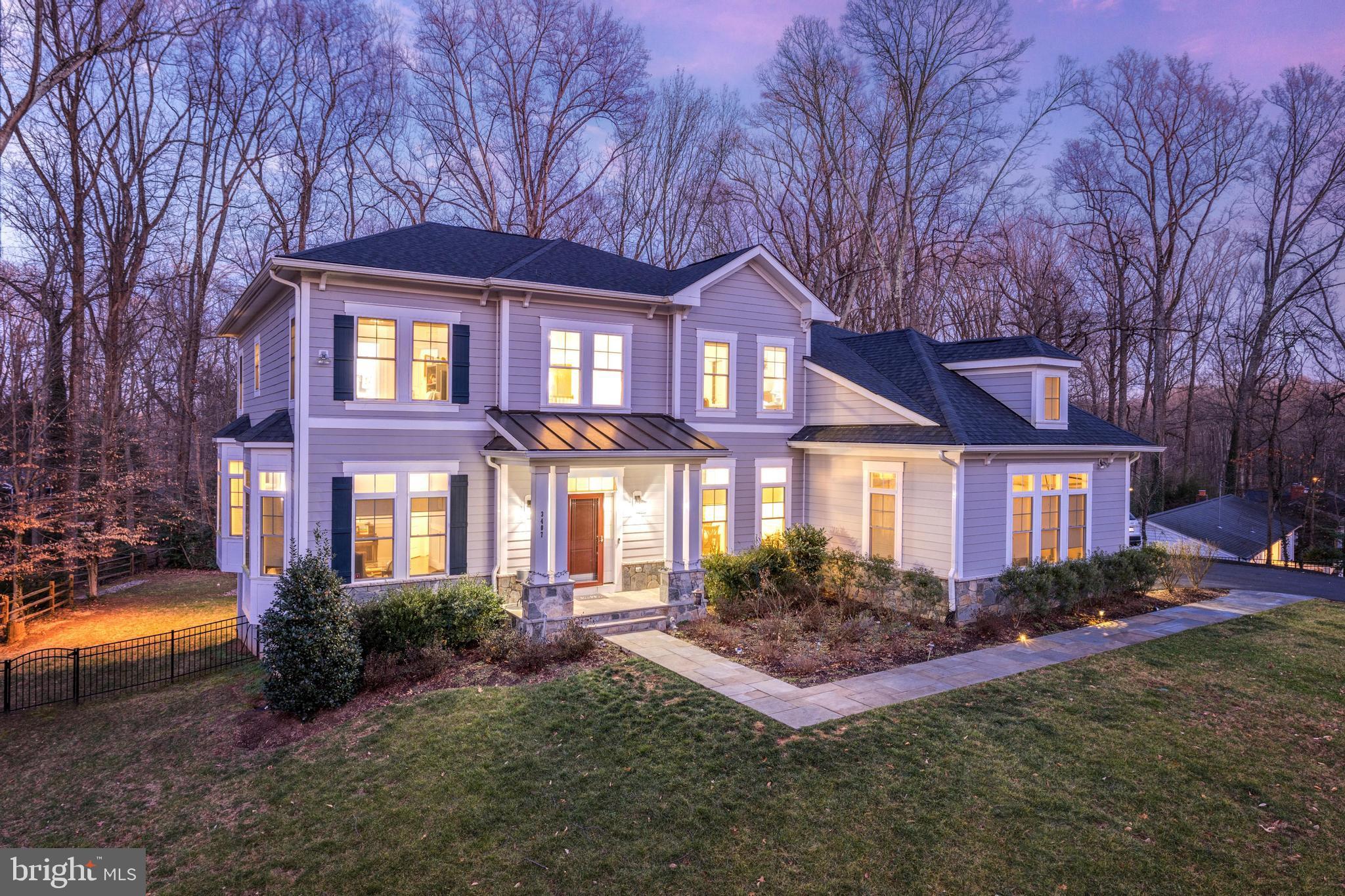 Exciting opportunity to experience a like-new home at its new and improved price! Situated on just under an acre, this impressive property offers the perfect indoor/outdoor lifestyle you are looking for. The elegant interior features the highest standard of quality craftsmanship and finishes - enjoy a 2-story foyer, tray ceilings, hardwood floors, extensive molding and trim, a gourmet chefs kitchen, and more. The floor plan is thoughtfully laid out for elevated living and offers flexible spaces for formal and casual gatherings alike. 4 generous bedrooms upstairs include a luxurious primary suite with a sitting area, 2 walk-in closets and a dreamy en-suite bath with his-and-hers separate vanities. The finished walk-out lower level features a 6th bedroom and full bath, perfect to use as an in-law suite! The 3 car garage includes an EV charger and additional storage space. Enjoy a private lot, backing to trees, with a spacious deck, play area and plenty of space for hosting friends. Incredible location in Mantua - trails, parks, pools and tennis courts all at your fingertips with no HOA! Close to Fairfax City, The Mosaic, Vienna Metro and major commuter routes.