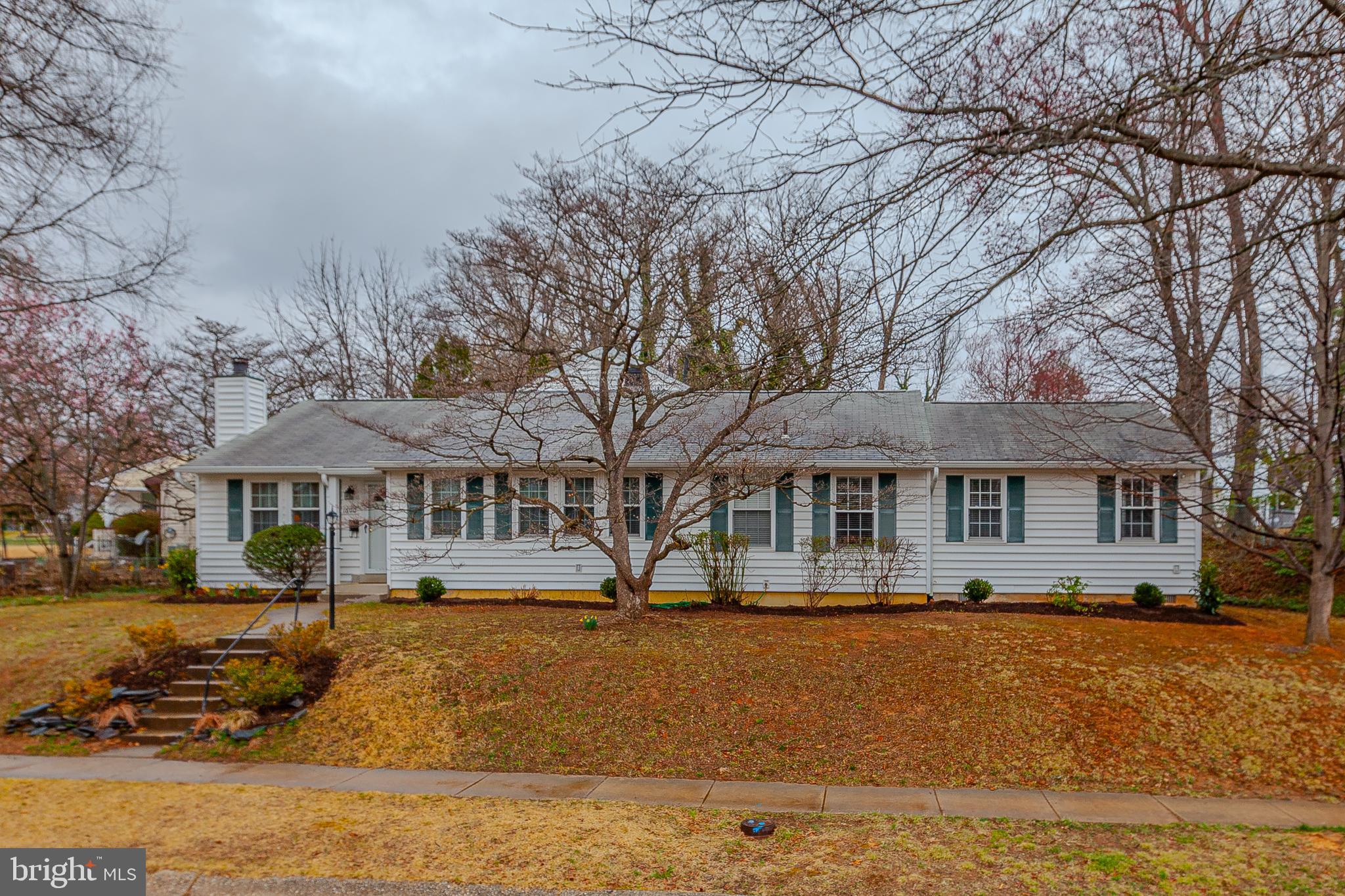 Open House Saturday April 5th (1-3pm) & Sunday April 6th (1-3pm) - WOW! This impeccable Rockcrest home has been expanded with multiple additions and has been meticulously maintained by long time owners! A sprawling main level begins with a charming front living room with fireplace, a guest bedroom and full bathroom! As you explore the rest of the main level you will find two additional guest bedrooms, an updated hall bathroom, an enormous primary suite with en-suite bathroom and walk in closet, a spacious separate dining room, an updated eat-in kitchen, and a large laundry room!  The main level is completed by a stunning family room addition that includes vaulted ceilings, a fireplace, and a sliding glass door to the backyard. A multi-purpose room at the rear of the home offers great space as a studio, craft room or simply additional storage space! The upper level holds a 5th bedroom, full bathroom, and large storage closet! A pristine yard is filled with natural wildlife including a variety of trees, shrubs, and flowers! This property is perfect for generational living and offers an extremely flexible floor plan for housing in-laws, extended family, or large gatherings! Truly a remarkable and home that exudes love and warmth! Close proximity to Rockville and Twinbrook Metros, Rockville Town Center, area schools, and major commuter routes make this location ideal for those looking for quick access to just about everything!  Come quickly!