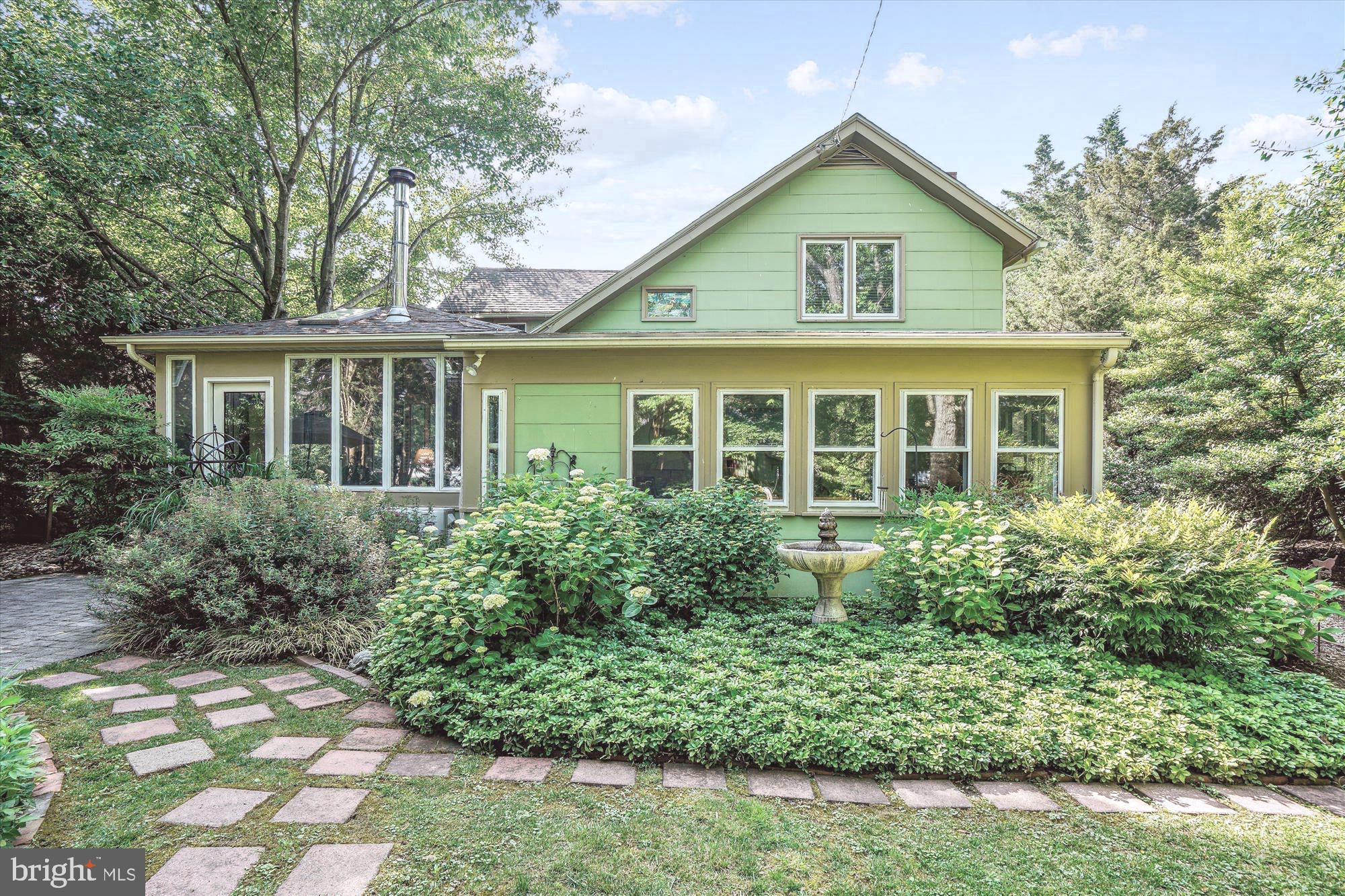 This unique property is nestled in a setting of mature trees and lush landscaping that gives it privacy from the main road. The original two-story, three room house’s first owner was probably a waterman and there are views of Dogwood Harbor from the rear of the property. The house dates from the early 1900’s and has undergone extensive renovations through the years, without compromising its historic character that gives it so much charm.  The combination of  Eastern Shore vernacular architecture and interior renovations without sacrificing the original details and materials creates a very unique home. All the major upgrades (roofing, windows, HVAC, crawl space, etc.), have been done.