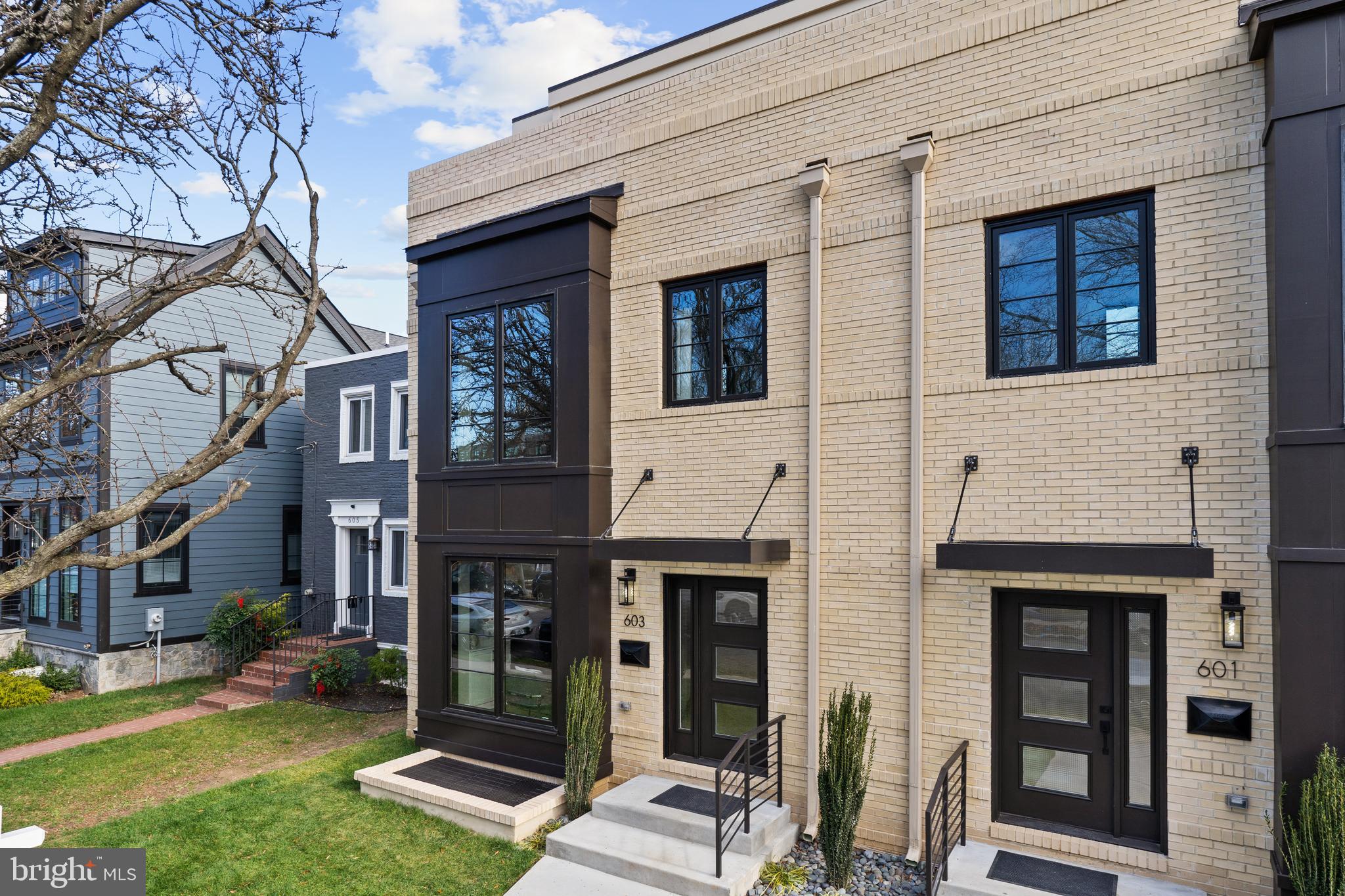 Welcome to 603 N. Alfred Street, a new RARE level of luxury living in Old Town!  
One of the ONLY brand new construction currently completed in Historic, Charming, Beautiful Old Town Alexandria.  This four level, 4 bedroom, 4.5 bath, sparkling, sun-drenched, pristine new build exceeds any of your lifestyle aspirations.  Built by award winning developer Regent Company, architectural highlights abound with sleek, striking modern design. 
Live with luxurious high-end fixtures and features including wide plank European Oak flooring on 3 levels.  Oversized, floor to ceiling black-framed windows provide incredible natural light.  
As you enter this custom residence, take in the beautiful gas fireplace enveloped in a 3-D marble surround, custom built-ins, high ceilings, built-in credenza and floor plan perfection.  The chef’s kitchen boasts custom white cabinetry, quartz countertops including a waterfall island, Stainless Steel GE Café Appliances, Microwave drawer, Pantry, Stainless Steel farmhouse sink, and deep drawer basins. Enjoy Regal Blue accent wall cabinets and breakfast bar seating, a separate dining area. 
The main living level additional highlights include a convenient powder room, Sonos enabled, smart box speakers and wiring for cable and Internet. Enjoy easy access to the fully fenced back yard showcasing a trellis patio, lush green lawn, private parking for two cars enclosed in a white picket fence with secure gate. 
The first bedroom level features two en-suite bedrooms, both with walk-in closets and stunning bathrooms.
Walk up one level and take in the Owner’s Suite with a gorgeous en-suite opulent bathroom with a freestanding soaking tub and oversized custom-tiled shower and a stunning and rare roof-top terrace.
The lower level features a family room, or 4th bedroom, another beautiful full bathroom, laundry, storage, and mechanical rooms.
This is a rare and unique opportunity to entertain your family and friends in modern style while embracing the fabulous Old Town lifestyle. Enjoy history, small town feel, and walkability in a stunning water-orientated and vibrant community.  Blocks to King Street’s nightlife, shops and restaurants.  Walkable to the revived Alexandria Waterfront and the King Street and Braddock Road Metros.  Wonderful location providing easy commuting options to the District, The Pentagon, The George Washington Parkway, and all major highways.  Welcome home!