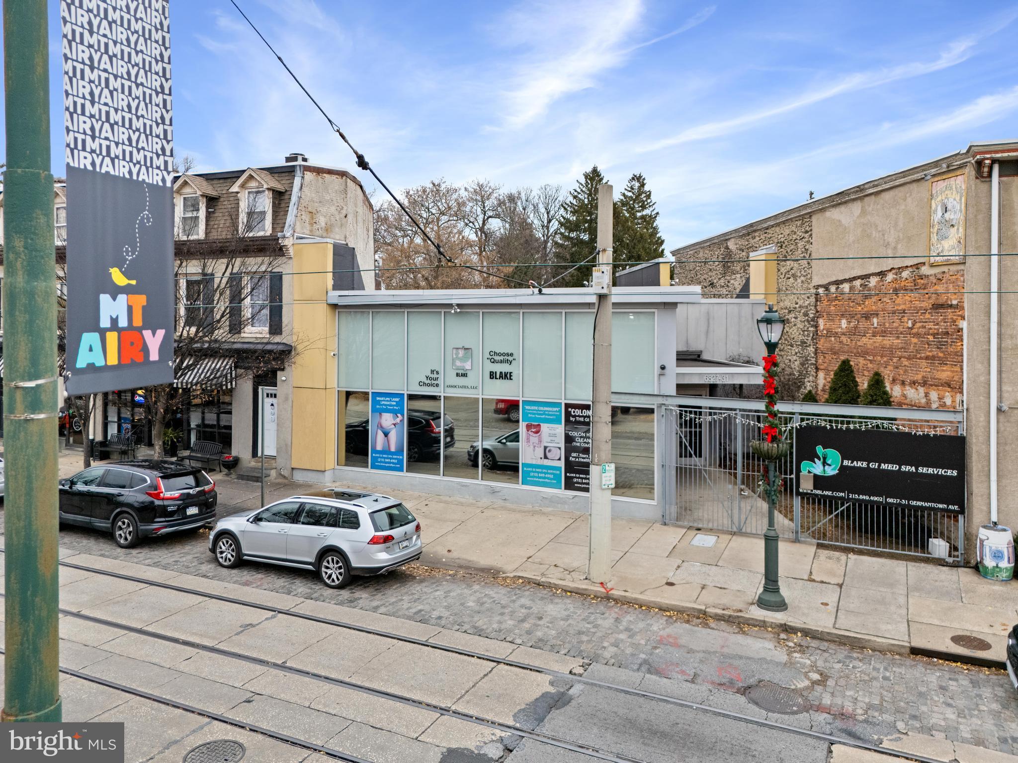 Signature modern building in the heart of Mt. Airy's business district, with expansion possibilities and rear off street parking lot.  Formerly used as a medical office, this property has zoning that can offer many potential uses including the possible expansion into additional floors above.  Located where Carpenter Lane meets Germantown Avenue, the area is vibrant with many shops, restaurants, institutions and a variety of housing stock. There is a driveway off of Meehan leading to a sizable parking lot behind the building.  Building plans, construction set, and zoning available to interested buyers. Make an appointment to see this special property today