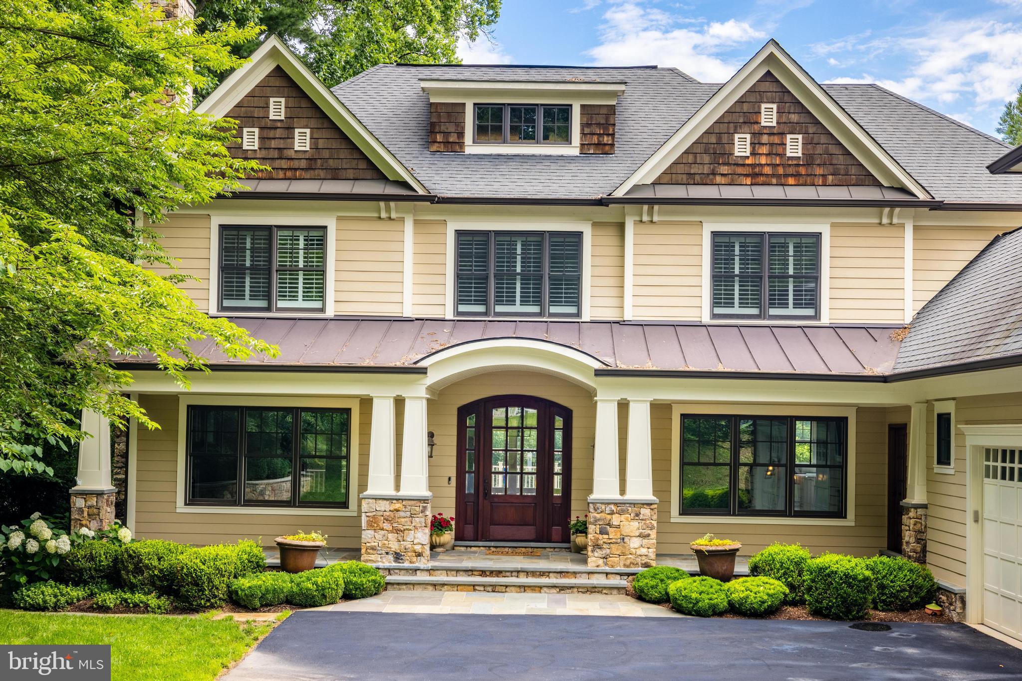 A true gem in turn key condition with a lushly landscaped lot * Ready for immediate occupancy just minute to Tysons, 495 and the Toll Road * Designed by renowned architect Richard Foster this beautiful mint condition home features 7250 sf of living with 6 bedrooms and 6.55 baths * Gleaming hardwoods on the main and upper levels, new light fixtures, wainscoting in several rooms, a Sonos sound system, neutral decor and light filled rooms are just a few of the special features * The floor plan is perfect for entertaining with every room connecting and flow from inside to outside * Flagstone covered porch and stained mahogany front door * Gracious foyer flanked by living and dining rooms * Three fireplaces (two with gas logs) * Family room with coffered ceiling, stone fireplace and triple glass doors to deck * Chef's kitchen with eat up marble top center island with a second sink, a six burner Wolf gas stove plus a wall convection oven and triple glass doors to deck * A study with a balcony * There is a second entrance into the mudroom with stairs to a 5th bedroom over the three car garage * The main level is complete with a butlers pantry with a wine cooler and two half baths * The upper level features a primary suite with cathedral ceiling, luxury marble bath and two walk-in closets with built-ins and three en-suites and a laundry room * All upper level rooms have plantation shutters * The walkout lower level features a recreation room with stone  gas fireplace and billiards room, a media room equipped with projector, wall screen and stereos, exercise room, and bedroom and full bath * The professionally landscaped front and backyards include a trex composite deck with gas grill hookup and an expansive flagstone patio which is partially covered and a partially fenced back yard including a fenced dog yard *  7906 Old Falls Road is a highly sought area for it's access to top ranked schools, its proximity to Tysons, the Silver Line Metro, shopping and restaurants. For hiking and nature enthusiasts, there is a 20 acre park at the end of Falls Road with paved paths going over bridges and streams all the way to the Spring Hill Rec Center.  Also,  just minutes to Great Falls & River Bend Parks, Difficult Run and Scotts Run with trails to the Potomac River. Also, it is just blocks to Spring Hill Elementary School & playgrounds, the Spring Hill Recreation Center with four turf sports fields and 20 acres of parkland with paths, bridges and stream. Commuters love the immediate access to the Toll Road and 495 for an easy commute to Washington DC, Dulles Airport and Reagan National Airport. In addition, it is just a few miles to The Capital One Concert Hall as well as Wolf Trap National Park for the Performing Arts.