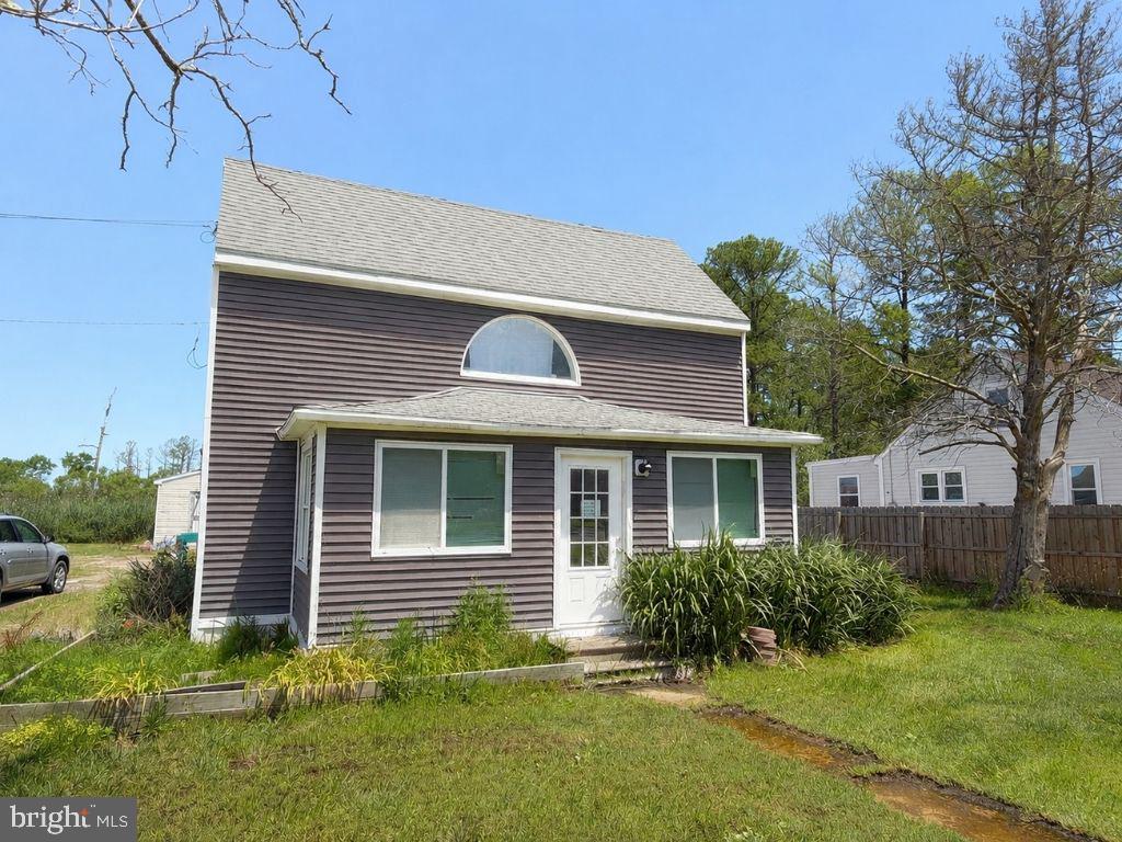 Full of character and country charm, this farmhouse on Deal Island Road offers an opportunity to own a piece of the Eastern Shore while adding your own personal touches. Major exterior updates have already been completed, including a newer roof, siding, windows, and exterior doors. The home features one bedroom on the main level and a large upstairs space that has been converted into two additional bedrooms. A rear-entry ramp provides convenient access to the home. Outside, you'll find two storage sheds and plenty of room to enjoy the peaceful surroundings. Whether you're looking for a primary residence, vacation getaway, or investment opportunity, this property offers great potential for the next owner. Property is being sold As-Is, Where-Is.