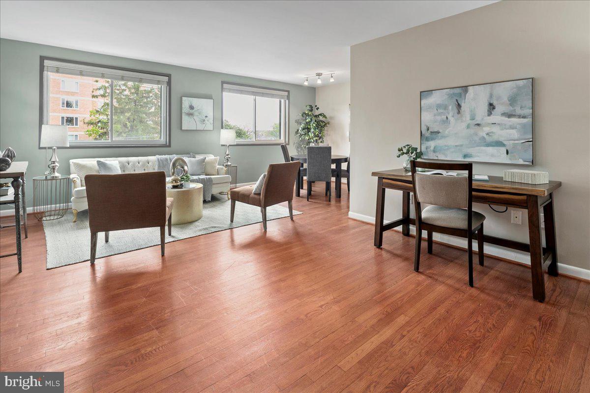 Unbeatable value with over 700 Sqft, this 1BR condo boasts bright east-facing views, work-from-home space, designated dining area, two oversized walk-in closets, parking, a deeded storage unit and all walkable to the Courthouse metro.

WHAT MAKES THIS AN EXCEPTIONAL CONDO? Recent updates include BOSCH Dishwasher 2024, microwave 2022, bathroom vanity 2022, blinds 2023, new windows installed in 2013, freshly painted in 2024 and kitchen beautifully renovated with added cabinet and countertop.

WHAT MAKES THIS COMMUNITY STAND OUT? The Adams House is a quaint community with peaceful cul-de-sac living, while also situated in a highly walkable location. Amenities include laundry facilities, roof deck, fitness room, parking and storage rooms. The sale includes two parking spaces in the community parking lot and plenty of guest parking, and one large deeded storage unit. All Utilities (electric, gas, water) are included in the condo fee $505. The units do not have water heaters or HVAC units for stress-free home ownership.

A PREMIER LOCATION Exceptional location with endless restaurants and bars, fitness studios, shopping, MOM's Organic Market and parks. Stroll to the Courthouse Farmers Market or across the Key Bridge to Georgetown, or jog/bike the Mount Vernon Trail with scenic vistas of the Potomac and Washington. Easy drive to Washington DC, Tysons, Pentagon, Amazon HQ2, two airports, and all major Northern VA commuting routes.

INVESTMENT PROPERTY This is an attractive, affordable investment opportunity with the condo having no rental cap and monthly rent projected at $2,000+/month

OPEN HOUSE - Sunday the 27th from 12pm-2pm