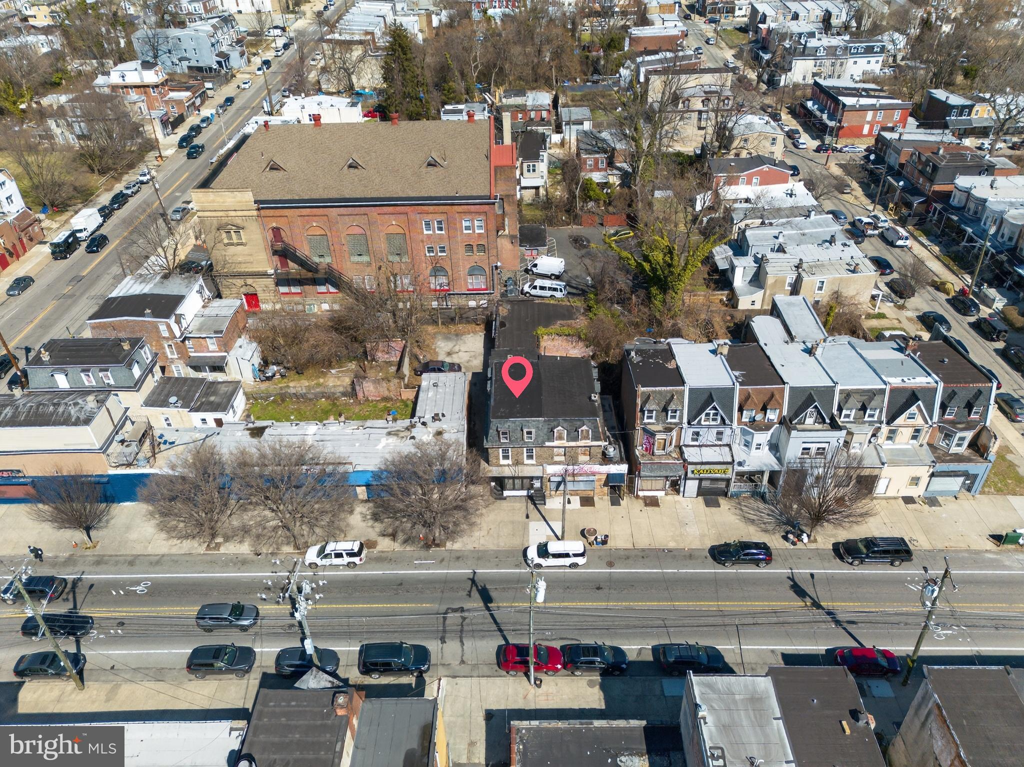 MASSIVE MIXED-USE OPPORTUNITY — 5657 Chew Avenue, Philadelphia, PA 19138 
Calling ALL business owners and investors — why rent when you can own?! This rare 3,447± sqft mixed-use property on a high-traffic Germantown corridor presents serious upside with commercial + residential potential under one roof.  
Ground Floor: Expansive commercial storefront with two garage door bays — ideal for retail, auto service, storage, event space, logistics, office, car sales, studio space and more.
 Upper Level: Generous residential footprint — easily convertible into two full apartments for additional passive income.
Parking: Up to 14 cars can be accommodated on site — huge bonus in the city!
Total Building Size:  3,447 sqft of convertible, high-value space.  
Located in a thriving neighborhood with strong visibility and traffic near La Salle University, public transportation, shops, eateries, and everyday amenities — this corridor continues to see reinvestment and demand.  
CMX2 - Zoning and layout offer endless possibilities:
Owner-occupied business + rental income
Multi-family conversion (upstairs)
Commercial/Multi-Use tenant mix
Showroom, warehouse, creative studio or distribution hub

Don’t miss this value-driven asset with massive expansion potential in a rapidly evolving part of Germantown.