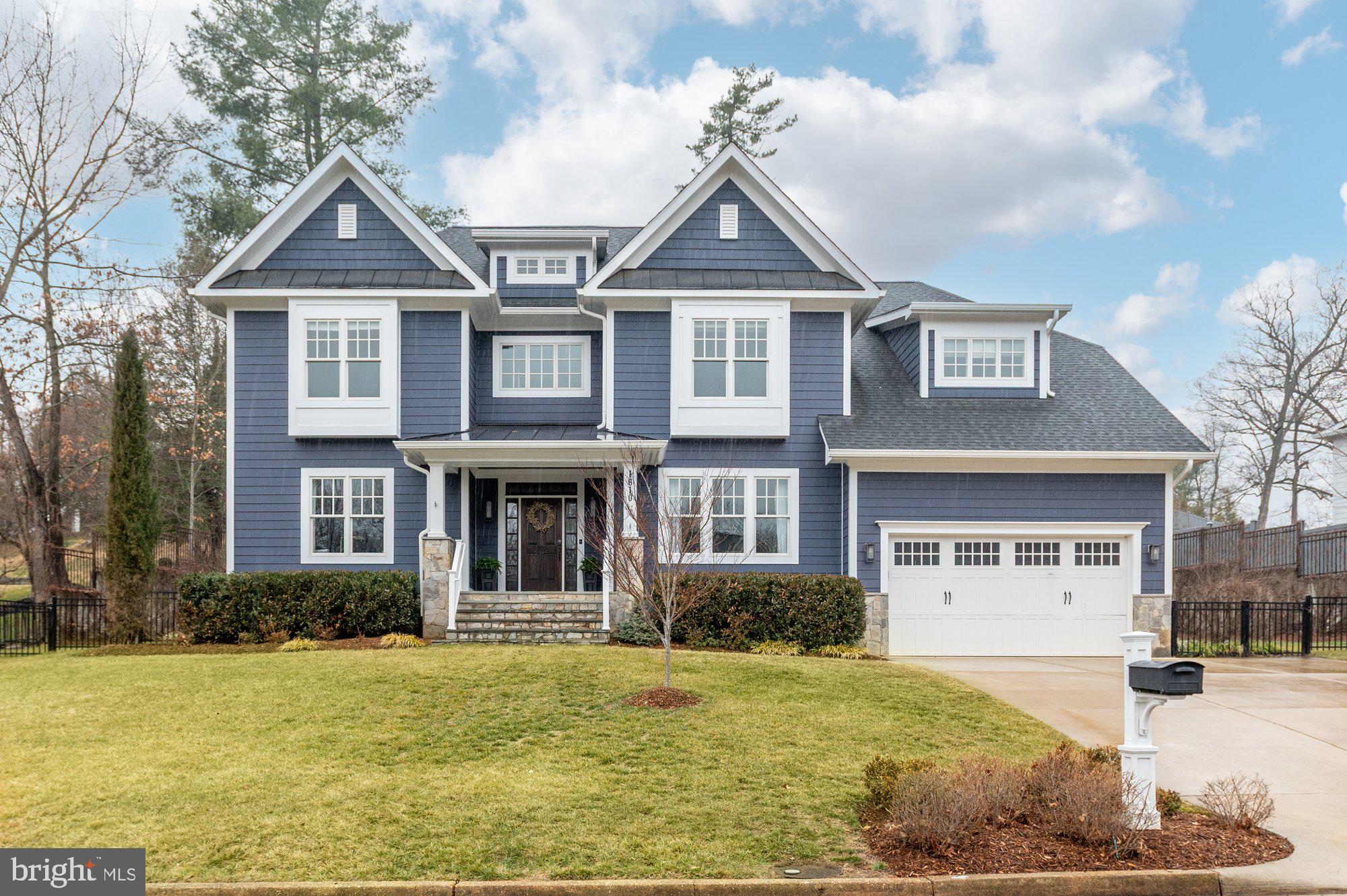 Custom built in 2019 by well known local builder, MR Custom Homes, this beautifully designed and move-in ready residence reflects a refined take on transitional craftsman design, where quality materials and intentional details take center stage. Ideally situated in the heart of Chesterbrook Woods—one of McLean’s most desirable neighborhoods and just one stoplight to Washington, DC—1610 Brookside Road offers 6 bedrooms, 6.5 bathrooms and over 6,000 finished square feet of thoughtfully scaled spaces  that feel both timeless and comfortably livable.

Inside, 9-foot ceilings, hardwood floors, and extensive millwork—including upgraded base, crown, and door moldings, custom built-ins, wainscoting, and coffered ceilings—create warmth, character, and cohesion throughout. 

The main level balances classic proportions with comfortable flow. Formal living and dining spaces are enhanced by detailed trim and built-ins, while the heart of the home—a well-appointed kitchen with custom maple cabinetry, quartz countertops, marble backsplash, oversized island with prep sink, and a premium appliance suite including Sub-Zero and Jenn-Air—opens seamlessly to the family room. A floor-to-ceiling tiled fireplace with built-in shelving provides a natural gathering place, making the space equally suited for everyday living or entertaining. 

A private office on this level also serves as a full bedroom suite, complete with its own full bath—offering exceptional flexibility. Whether used as a dedicated work-from-home space, guest quarters, or main-level bedroom for multigenerational living, this suite ensures comfort and privacy without compromise. 

Upstairs, the primary suite is a calming retreat featuring two expansive, custom walk-in closets with bespoke built-ins and exceptional storage. Just beyond, a windowed flex space with a built-in desk offers a rare and versatile extension—ideal as a private office, creative studio, or dedicated planning area.  The spa-inspired bathroom offers a soaking tub, frameless glass shower, and dual vanities with quality finishes. Each additional bedroom includes its own en suite bath, and the upper level laundry room adds convenience and organization to daily routines. 

The fully finished lower level expands the home’s flexibility with a spacious recreation room, game area, exercise room, additional bedroom and bathroom, and walk-up access to the backyard—ideal for guests, hobbies, or relaxed gatherings. 

The backyard is a thoughtfully designed outdoor living environment, offering three distinct spaces for entertaining and relaxation. The deck accommodates a full dining arrangement for elevated al fresco gatherings, while the covered porch—complete with built in Bromic ceiling heaters, a ceiling fan, recessed lighting and a mounted television—creates a seamless extension of the home for year-round enjoyment. A separate patio anchored by a firepit and built-in LED lighting and generous seating provides a more intimate setting for evening conversation. Beyond these curated spaces, the lawn offers ample room for recreation and play, delivering both sophistication and functionality.

Additional features include a two-car garage with EV charger, an extra driveway space for a third car, a two-zone HVAC system, energy-efficient construction, and a professionally landscaped 0.35-acre lot. 

Located just one stoplight from DC and minutes to parks, trails, shopping, and major commuter routes, 1610 Brookside Road offers timeless design, modern comfort, and an exceptional location in McLean.  Chesterbrook Elementary, Longfellow Middle, and McLean High School Pyramid.