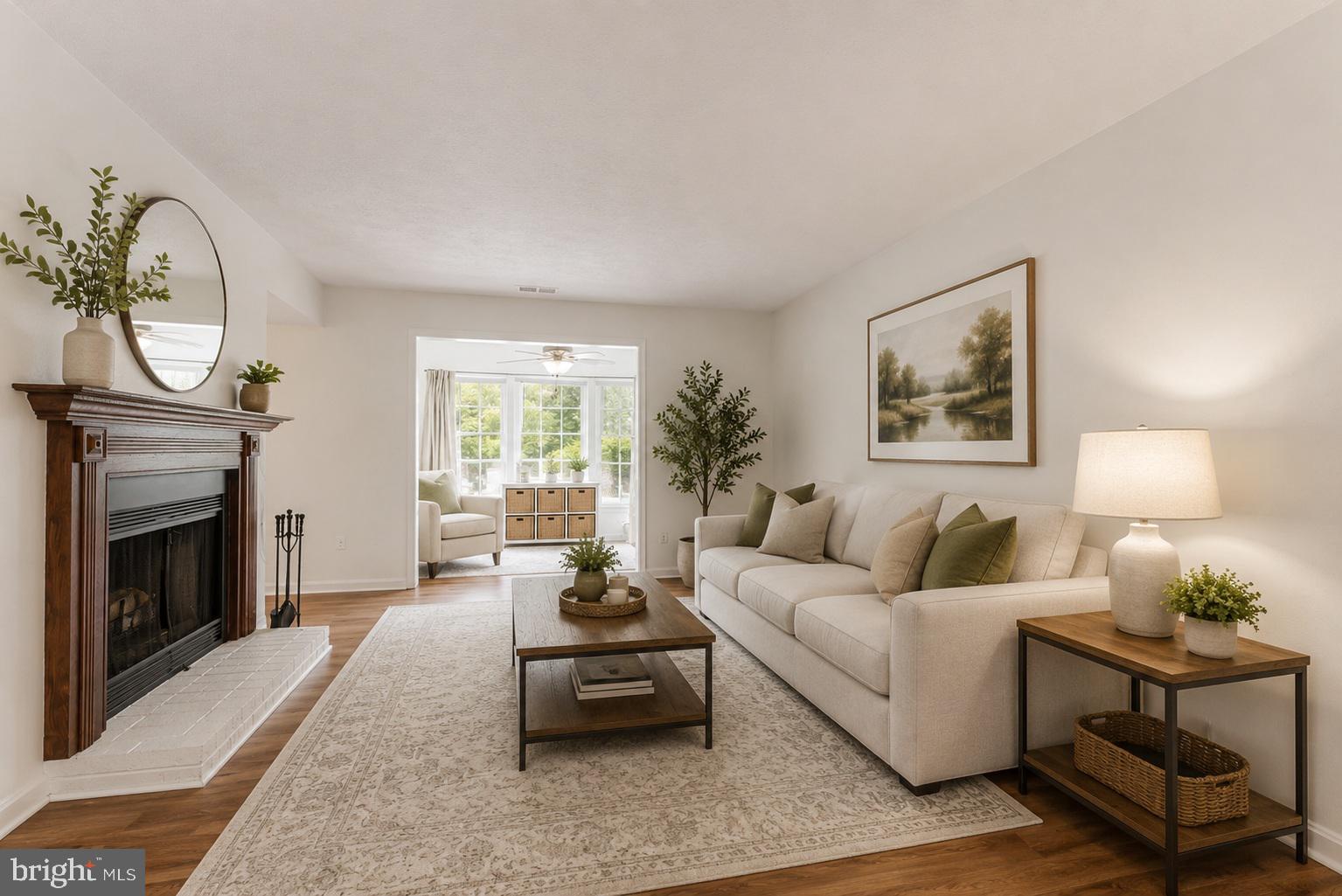 Welcome to 12146 Cardamom Drive — a beautifully updated, one-level living condo tucked into the desirable Vinings community in Lake Ridge, Woodbridge.

From the moment you step inside, you're greeted by an updated interior and abundance of natural light throughout. The open living, dining, and sunroom area offers a comfortable, versatile layout — ideal for everyday living or entertaining. A bright sunroom and adjoining den provide flexible space perfect for a home office, reading nook, or quiet retreat, while the den's charming features add character and warmth to the home.

The fully renovated kitchen is a true highlight, featuring crisp white cabinetry, updated countertops, a designer mosaic tile backsplash, stainless steel appliances including a gas range, built-in microwave, and a deep stainless sink — all thoughtfully updated for both style and function.

The spacious bedroom offers a peaceful escape with plenty of natural light, while the well-appointed full bathroom rounds out this move-in ready home. A dedicated in-unit laundry room with cabinetry and shelving provides excellent additional storage — a rare convenience in condo living.

Step outside to your own private covered patio, a quiet outdoor space surrounded by mature trees and a peaceful wooded common area — perfect for morning coffee or unwinding after a long day.
Ideally situated in the established Vinings community within Lake Ridge, residents enjoy access to community pools, playgrounds, walking trails, and the Lake Ridge Marina, all just minutes away. Commuters will love the convenience of nearby express bus service to the Pentagon and Washington, D.C., along with quick access to I-95, Route 1.