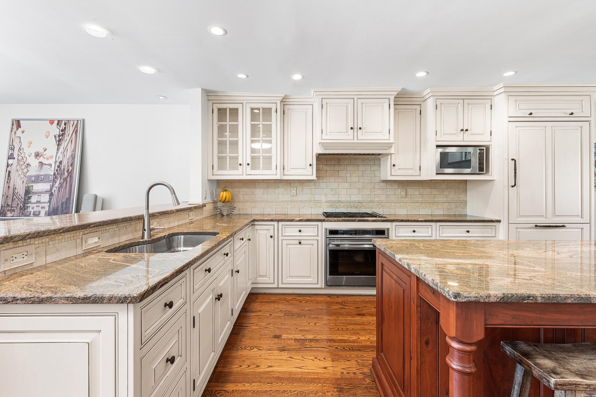 Welcome to sophisticated living in the heart of Ardmore! This fabulous residence at 119 E Montgomery Avenue, Unit #7, offers an unparalleled combination of comfort, modern convenience, and a prime location within one of the area's most sought-after communities. Inside, discover a bright and inviting space that has been thoughtfully maintained. The spacious gourmet kitchen is fully equipped for your culinary needs with granite counters, stainless steel appliances, recessed lighting and center island/bar and extra custom cabinetry. The kitchen opens to a charming dining area and family room with a cozy fireplace. A convenient half bath completes the main level. On the upper two levels you will find four generously-sized bedrooms, one of which is a Primary Suite with an updated ensuite bathroom, a guest bedroom with ensuite bathroom, as well as an additional full bathroom in the hall. Beautiful hardwood flooring throughout the home is a huge plus, as is the lovely stairway window seat where you can cuddle up with a good book and take in the private natural view! The lower-level houses the laundry area, utilities and storage space, as well as access to the two-car garage. Relax in the community’s outdoor private patio setting surrounded by natural plantings, which is just moments from your front door. From the Lancaster Avenue entrance, you are perfectly positioned to enjoy the vibrant lifestyle of downtown Ardmore and Suburban Square where you can take advantage of premier shopping and trendy dining options. Additionally, this home is just minutes away from the Ardmore Train Station, making your commute into Center City or New York a breeze! There are also several hiking and biking trails nearby…and let’s not forget that this home is also located in the award winning Lower Merion School District. This unit offers a worry free, low-maintenance lifestyle in a community that values both privacy and access to all the charm of the Main Line. Whether you are looking for your first home or a stylish downsized retreat, this Ardmore gem is not to be missed. Schedule your appointment today!