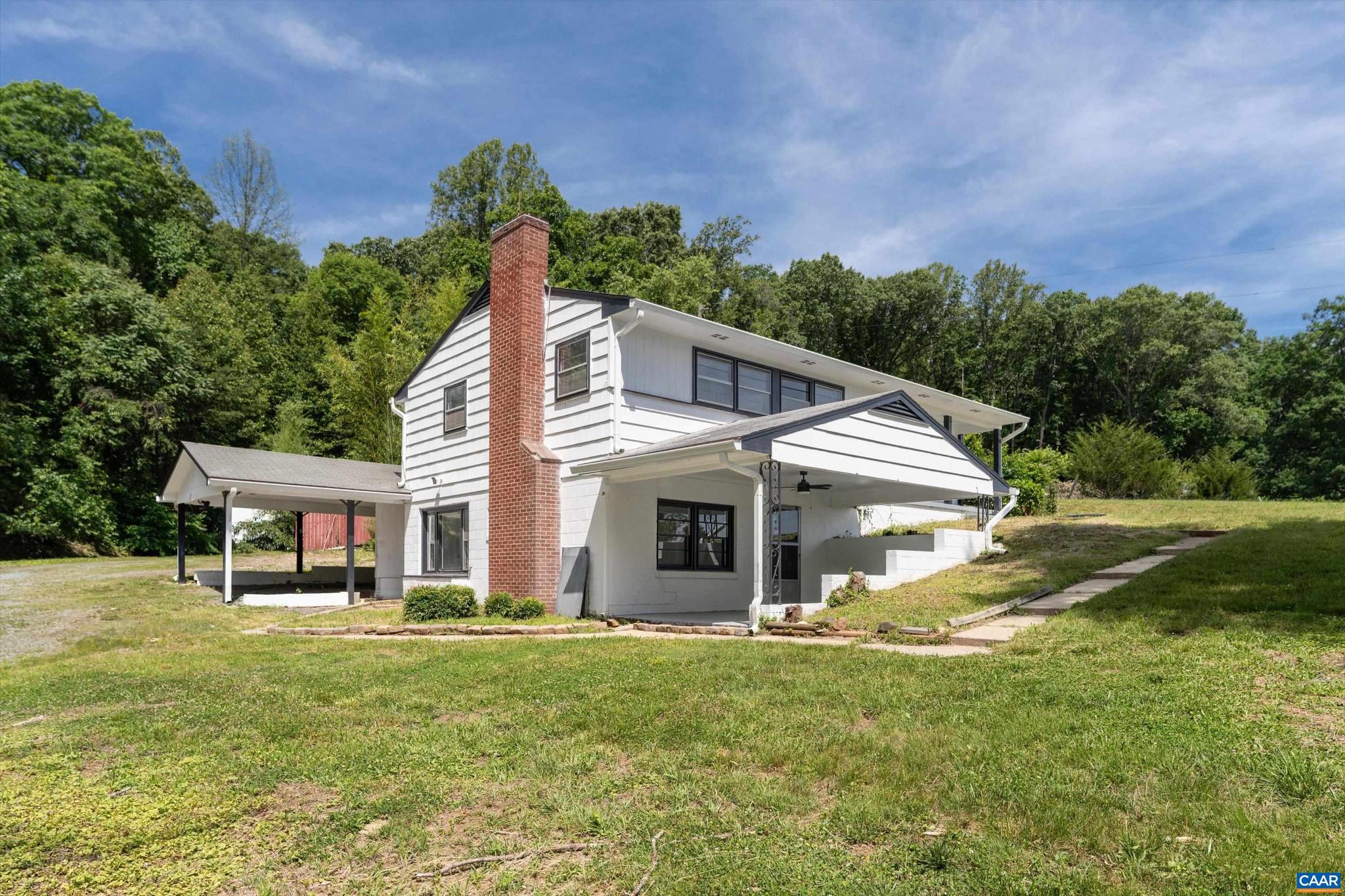 Charming multi-dwelling property in Barboursville, offering a flexible setup with a main home and separate cottage along the convenient Route 29 corridor between Charlottesville and Ruckersville. This prime location provides quick access to NGIC, shopping, dining, and major employment centers while maintaining a peaceful rural setting. The main residence features 3 bedrooms and 2 bathrooms with comfortable living spaces and a flexible lower level offering additional room for recreation, storage, or future use. Recent improvements include new LVP flooring, newly finished hardwood floors, and a brand-new HVAC system. A cozy wood-burning fireplace adds warmth and character to the main living area. A detached cottage provides a second living unit with its own kitchen, living area, bedrooms, and bath?ideal for rental income, guest accommodations, or multigenerational living. Set on a scenic lot with open yard space and countryside views, the property offers privacy, versatility, and strong potential. With two separate dwellings, this is a rare opportunity for investors or homeowners seeking flexible living options in a highly accessible Barboursville location.