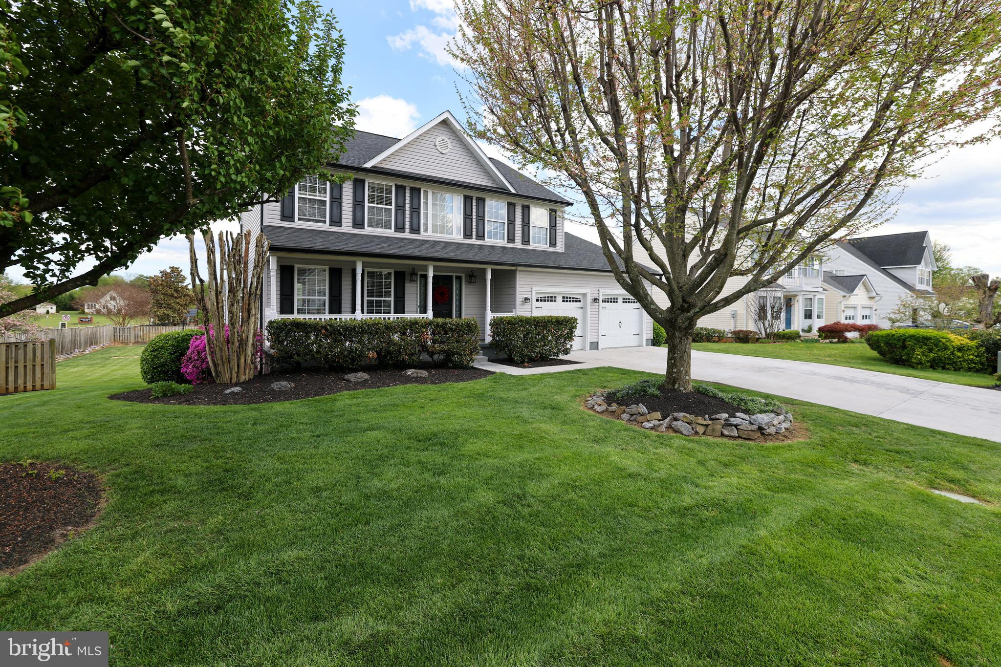 Turn-key and beautifully updated, this stunning corner-lot home in the heart of Berryville offers the space, upgrades, and outdoor living today's buyers are looking for. Featuring 5 bedrooms, 3.5 baths, a fully finished basement, and a professionally landscaped, fully fenced backyard, this home is move-in ready from top to bottom.

The open-concept main level showcases fresh paint (2026), hardwood floors, and a renovated gourmet kitchen (2026) with quartz countertops, custom cabinetry, stainless steel appliances, and recessed lighting—adjoining family room with cozy gas fireplace.

Upstairs, you'll find four spacious bedrooms, including a luxurious primary suite with dual walk-in closets and a beautifully updated bath (2026). The finished lower level offers even more living space, including a fifth bedroom, updated full bath, a wet bar, and new carpet and paint (2026).

Step outside to enjoy the private backyard retreat featuring a Trex Deck (2024), patio, basketball court, storage shed, and professional landscaping. Additional updates include a new roof (2025), oversized two-car garage, and driveway parking for four vehicles.

Ideally located just minutes from downtown Berryville, this exceptional home combines modern updates, generous living space, and outstanding outdoor amenities.