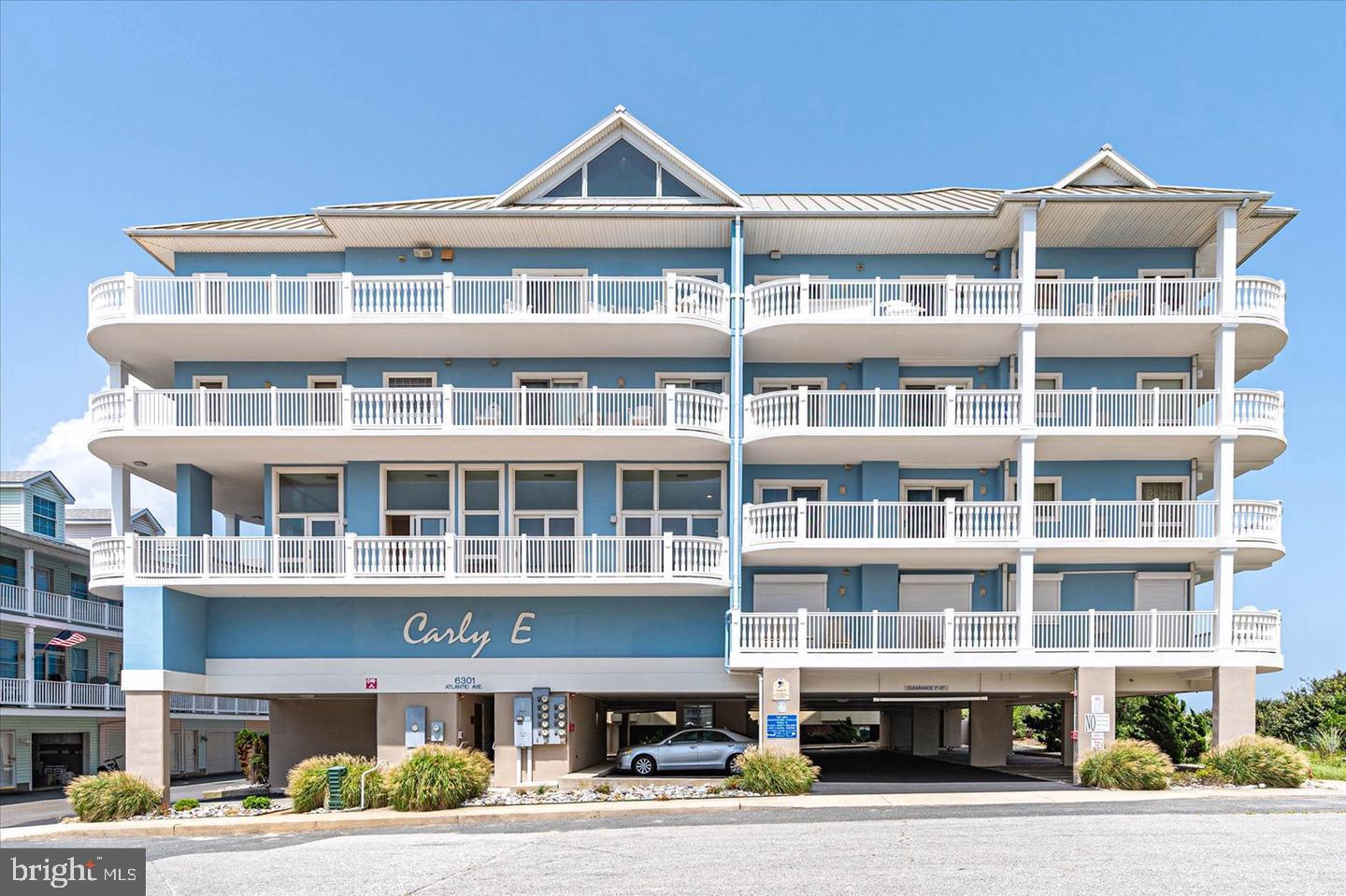 You found it!  An oceanfront condo that combines an extraordinary residence with an extraordinary building... in an extraordinary location. (We apologize for the possible overuse of "extraordinary".... but we felt it was warranted in this case).

That's exactly what you'll find at Carly E #301.

Located within OC's premier oceanfront boutique condominium, this beautifully furnished third-floor residence offers nearly 2,000 square feet of luxury living.    That makes it one of the largest three-bedroom oceanfront floorplans you'll find anywhere on the island.  Add an oceanfront end-unit location, soaring ceilings, a gourmet Viking kitchen with a gas range, a gas fireplace, electric storm shutters, and panoramic Atlantic views, and you begin to understand what we're so excited about.   

With only nine residences in the entire building, owners enjoy a level of privacy that's difficult to find in Ocean City. There are fewer neighbors, less elevator traffic, quieter common areas, and a true boutique atmosphere that simply feels different from larger high-rise buildings. Add a beautifully maintained indoor atrium pool, controlled-access elevator lobby, covered parking, private storage lockers, and one of the strongest, most respected condominium associations in Ocean City, and you're in thin air, with not a lot of competition to speak of.

Inside residence #301, "quality" is all you'll see.  Expansive wood work, custom finishes, high ceilings, views overlooking the Atlantic Ocean, and an open (oversized) floorplan.... all combine to create a luxury retreat unlike anything else at the beach. The gourmet kitchen is designed for people who actually enjoy cooking, featuring premium Viking stainless steel appliances, a gas range that's rarely found in Ocean City condominiums, generous workspace, and beautiful cabinetry that anchors the heart of the home.

The spacious oceanfront balcony quickly becomes your favorite room without walls. Sunrise coffee. Afternoon sea breezes. Evenings spent listening to the waves. It's the kind of outdoor living space that reminds you why you chose the ocean in the first place.

------  Location matters just as much.

Positioned on 63rd Street at the base of the Route 90 Bridge, you'll enjoy one of the easiest arrival experiences anywhere in Ocean City. Instead of driving the length of the island every Friday or Saturday, you're home within minutes of crossing the bridge. At the same time, you'll enjoy one of Ocean City's widest, least crowded stretches of beach, while remaining just a short walk from some of the area's favorite restaurants, shopping, and entertainment.

This residence is currently a successful weekly rental through Central Reservations, providing the next owner with the flexibility to continue generating income while enjoying one of Ocean City's premier oceanfront addresses.

Some luxury properties impress you the day you walk through the front door.

The very best ones continue impressing you every time you come back.

Carly E #301 is one of those rare places.  ****UPDATED AND ADDITIONAL PHOTOS TO BE ADDED BY 7/26