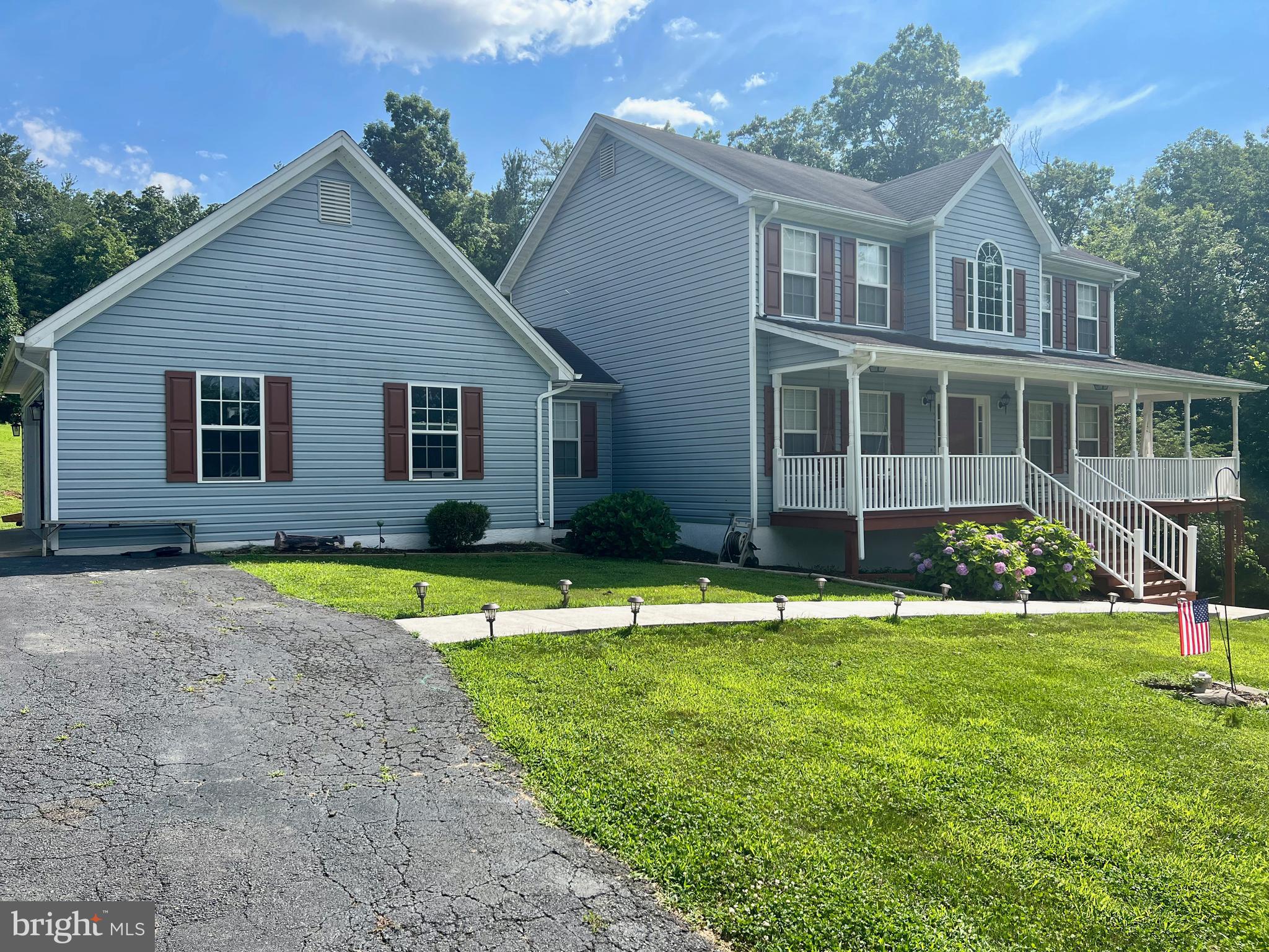 Motivated Sellers. No HOA, 3 HOMES on 1 Tax Parcel, Investment Properties and live there too.    8 Acres with mostly Year-Round Stream/Creek, Wildlife, Hunting, Trails; HOME#1 is a Colonial (Newest Home), American Standard HVAC 3-Year old,  Appliances 4 Years old, 3 Bedrooms Upstairs, Primary Bedroom has Sitting Room/Office/Nursery with Primary Bathroom having Split Sinks/Countertops, Shower and Soaking Tub to relax and enjoy after a busy day, Walk-Out Level Basement possibly may be utilized as an apartment with it's own walk-out entrance and Paved Driveway, 
Wrap-Around Front Porch to enjoy the Seasonal View of the Blue Ridge Mountains and Rear Deck with Steps to the spacious Back Yard, Sidewalk, Outside Faucet(s) and Outlet(s), Shed(s), Very Private; 
HOME#2 (Much Older and Dated Home) has Living Room, Dining Room, Kitchen with Refrigerator, Gas Stove, Double Sink, Full Bathroom, 2 Bedrooms, Laundry Room, Covered Front Porch, Basement/Cellar, Metal Roof; 
HOME#3 (Much Older and Dated Home) has Kitchen with Refrigerator, Newer Hot Water Heater (behind Refrigerator), Electric Flat-Burner Stove, Sink, Living Room, 2 very small rooms, Full Bathroom, Fenced Yard and Front Porch, Metal Roof. Tenants would like to stay and are good paying, on month to month and has been there many years. Trails in Woods, Nice Bridge crosses over a year-round Stream/Creek as you go up the Paved Drive to your new home.
Information in the Listing is for the Main Home.