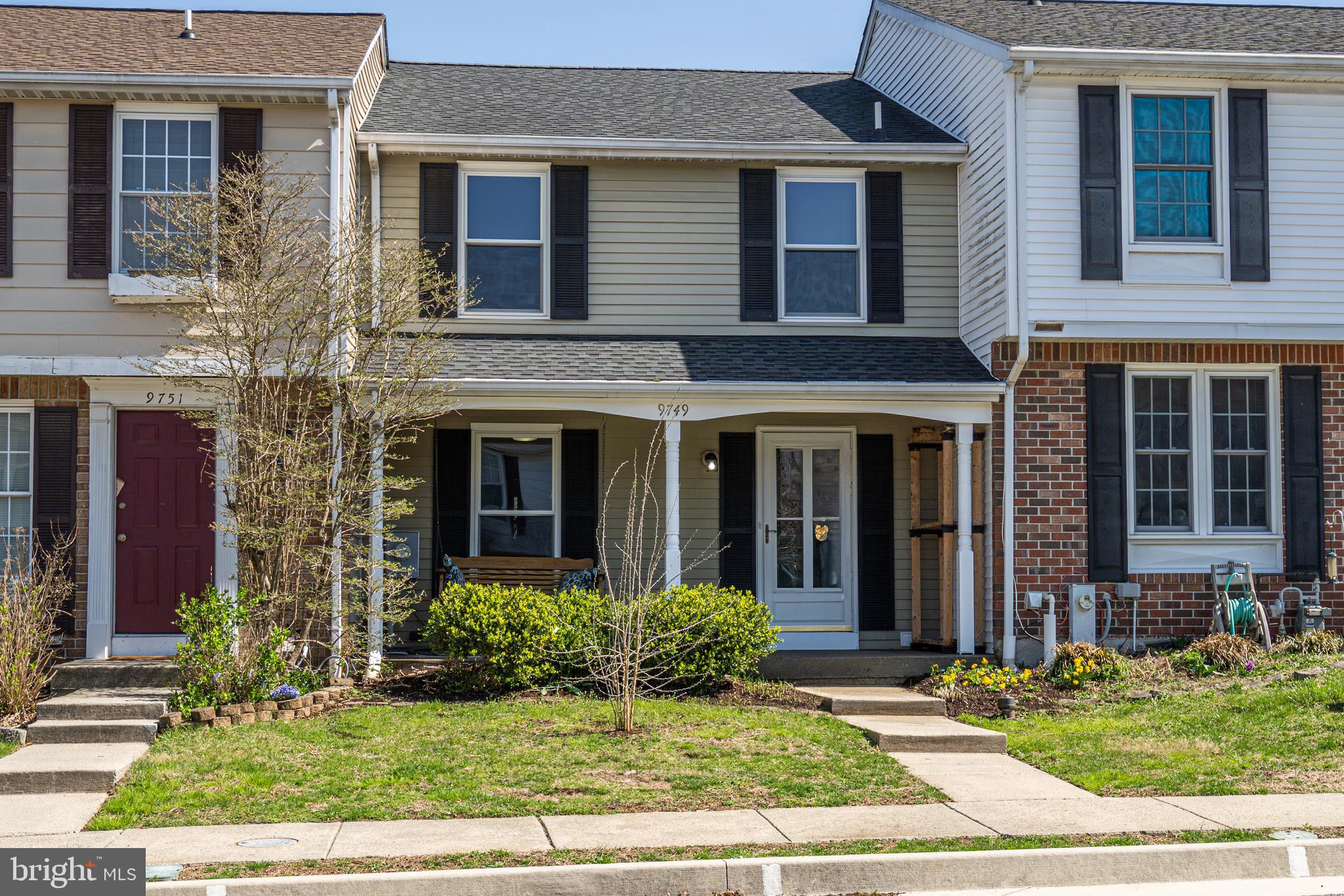 This bright and spacious townhome in Cloverfield Manor with its stylish and functional covered front porch is ready for you to move right in. All three finished levels are freshly painted with new flooring. Enjoy the two-level deck backing to trees, common area and walking trails. Beyond the grassy area of your private backyard, there is a SEPARATE 10X10 INSULATED WORKSHOP/barn style shed with loft, electricity, air cleaner, window exhaust and A/C awaiting your desired use. There are just too many options to list! Spend your weekends relaxing under the retractable awning or venture out to enjoy boating, fishing, biking or hiking at nearby Loch Raven Reservoir Park. Upstairs you’ll be able to spread out among three bedrooms and two full bathrooms. There are also convenient half baths on each of the lower levels. Easily store your holiday decorations and more in the accessible, partially floored attic space. The entry level has a roomy kitchen in front overlooking the porch and swing. Enjoy a larger than usual pantry and modern cut-out pass-through opening to the hardwood dining area. Past the dining area with its crisp white chair and crown molding is the living room showcasing a large wood burning fireplace with slate surrounds and a full wood mantle. Stepping outback from here you will be atop the freshly painted double deck with stairs and a view! Not finished yet…stroll downstairs from either inside or out to another full finished level. You'll find that convenient half bath right at the bottom of the stairs and a laundry/utility area to your immediate right. Down the hallway a bit past the built-in shelving, brand-new carpet brightens the separate large den/office/playroom with closet. Yet another space with so many potential uses! Finally, wood parquet flooring grounds the family room where you’ll come full circle to that wonderful level exit to your lower-level deck, backyard and more. Great layout and location, come see it in person before it’s gone!