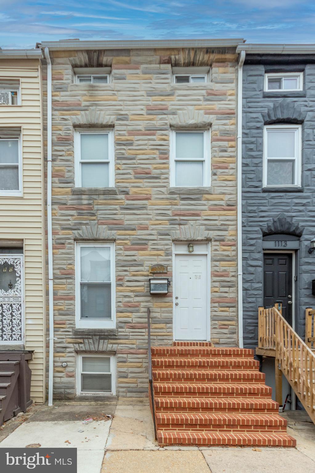 List price to be opening bid at online only auction.  Online auction to be conducted on Auctioneers website. Bidding Wednesday, April 2 & ends Monday, April 7, 2025, at 11:30AM. This charming 2.5-story townhouse with a basement is located in the desirable "Hollins Market" neighborhood of Baltimore City. The home offers 3 bedrooms and 1 full bath. The backyard is fenced-in; and can be accessed from a walkout in the lower level and a walk-down from the small porch off the back of the house. The main level features an open floor plan with a living area, dining area, and kitchen. The second level includes 1 bedroom and a full bath. The third level has 2 bedrooms. The lower level is partially finished and houses the home’s mechanical systems and laundry area. This property is currently occupied but will be vacant at settlement, providing the new owner with the opportunity to renovate and flip or use it as a rental property. Conveniently located just north of Washington Village (Pigtown), this home is close to downtown Baltimore and offers easy access to Horseshoe Casino, M&T Bank Ravens Stadium, Oriole Park, CFG Bank Arena, as well as a variety of restaurants, hospitals, Union Park, Carroll Park, and more.