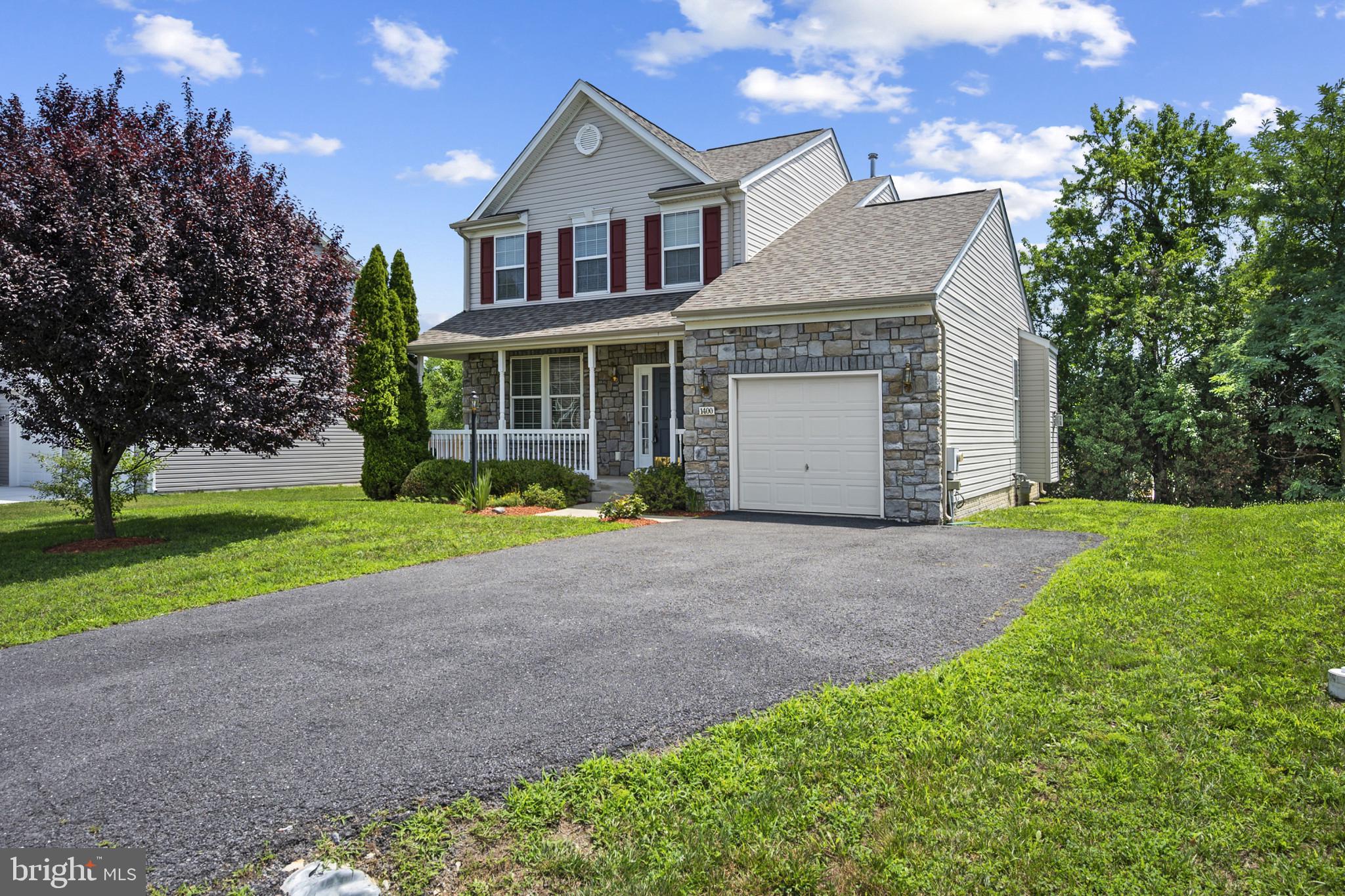 A rare opportunity in Prentiss Point! Skip the townhome layout and step into this beautiful, fully detached colonial-style home. Sitting on a generous, level lot, 1400 Prentiss Point Parkway offers the space, privacy, and independence of single-family living at a price point that is hard to find in today's market.

Built in 2008, this home features a highly functional 1,684-square-foot layout. The main level welcomes you with an open and inviting floor plan, featuring a spacious living room centered around a cozy fireplace—perfect for relaxing evenings. The flow continues into a bright kitchen and dining area with easy access to the backyard, making indoor-outdoor entertaining seamless. A convenient half-bath completes the main floor.

Upstairs, you will find three comfortably sized bedrooms and two full bathrooms. The primary suite serves as a peaceful retreat, complete with a private en-suite bath and ample closet storage.

Outside, the level yard provides plenty of room for gardening, play, or hosting weekend BBQs. Located in the highly commuter-friendly 25401 zip code, you are just minutes from Route 9, I-81, local schools, shopping, and dining. Don't wait for new construction timelines—this established single-family home is move-in ready and priced to sell. Schedule your private tour today!