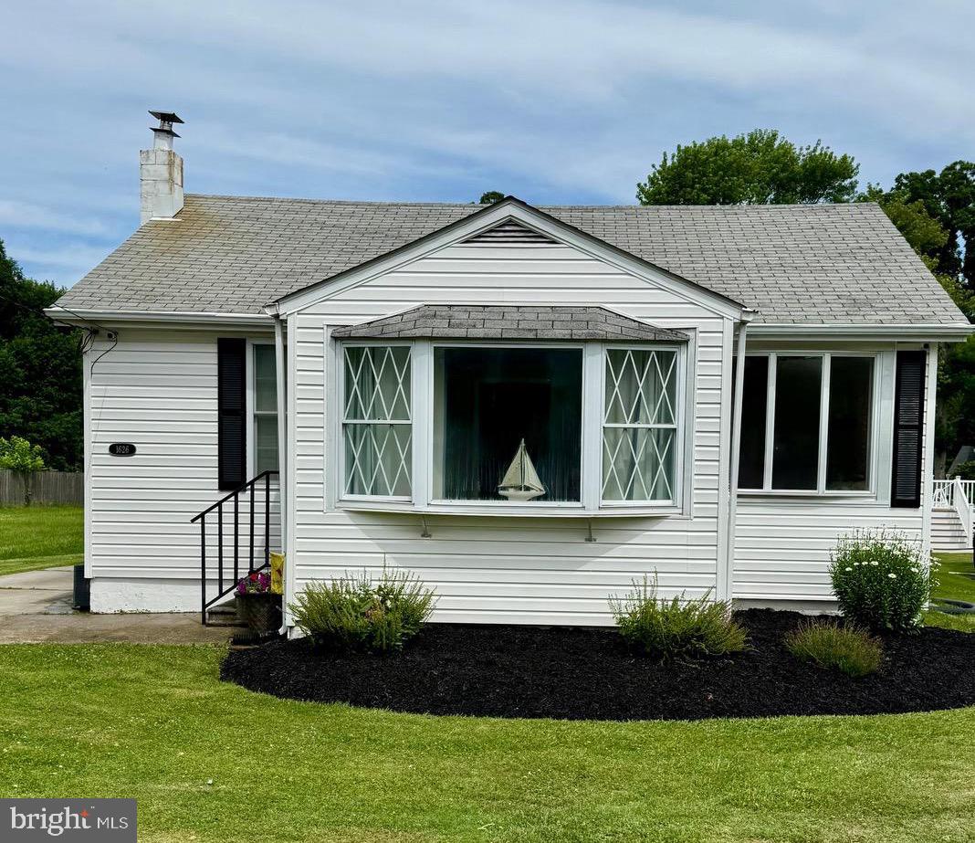 Welcome Home to this Charming Meticulously Maintained Bungalow with  One Floor Living.   Hardwood Floors in Living Room and Bedrooms with nice size closets. Updated Bath with Ceramic Tile (2021), Luxury Vinyl Flooring (2026) in Kitchen, Laundry Room and Hallway.  Stainless Steel Appliances.  New Hot Water Heater (2025), Freshly Painted (2026).  Incoming Sewer and Water Line Replaced (2026).   24' round Above Ground Pool will finish off your hard day at work.  A wonderful entertainers delight.  A 2 Car Detached Garage adds convenience and additional storage.
Come enjoy your mornings and evenings on the Back Covered Deck.