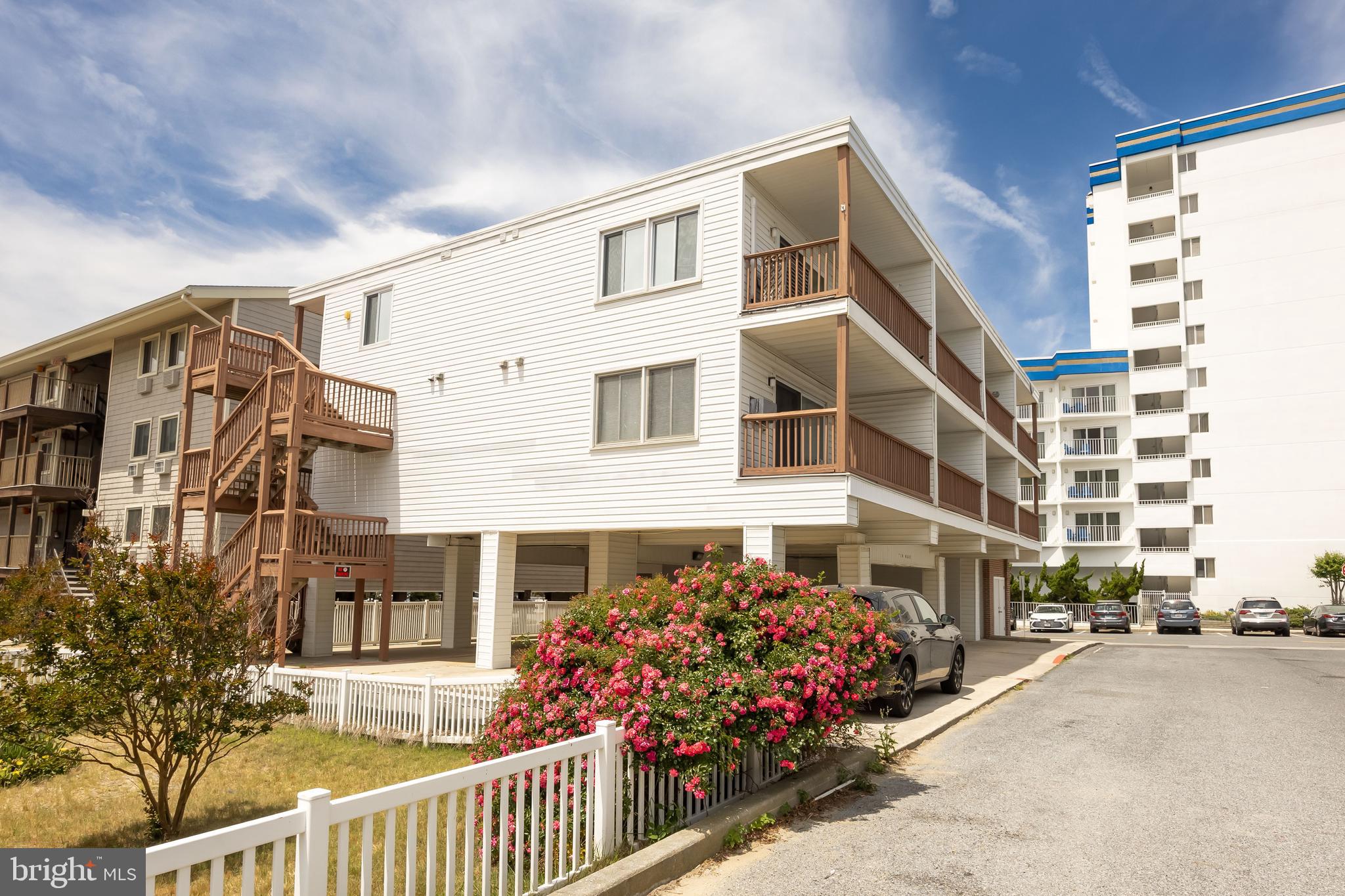 Wake up to ocean views from you balcony and the sound of the waves in this charming ocean block 1-bedroom, 1-bath condo. Perfectly situated in the first building off the oceanfront, you're just steps from putting your toes in the sand. Located on the 2nd floor, this inviting retreat offers beautiful ocean views from your private balcony. The updated kitchen, tile flooring throughout, and stylish furnishings create a comfortable, turn-key coastal getaway. A huge ground-level storage closet provides plenty of room for all your beach gear, and the assigned parking space adds convenience. Whether you're looking for a personal beach escape, vacation rental, or year-round seaside living, this property offers the ideal blend of location, comfort, and coastal charm.