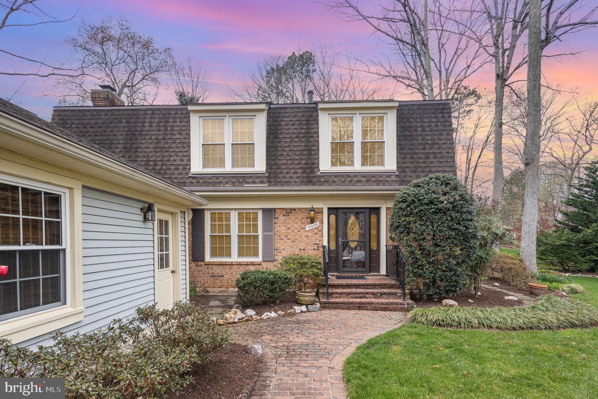 Charming four bedroom colonial in the sought after Lake Ridge community.  This home has been well cared for by its original owners. Nicely situated on a quiet cul de sac lot. Harwood floors on the main and upper levels. Formal living room and dining room with crown molding.  The eat in kitchen features newer cabinets, Corian counter tops, and newer appliances.  The cozy family room is off of the kitchen and includes a gas fireplace. Additional room can be used as den or office and enters directly into the garage. Upstairs are 4 spacious bedrooms with ceiling fans. The primary bedroom includes a private bath. The hall bath has been updated with a new vanity and new toilet.  The yard is beautifully landscaped with mature trees and shrubs and many flowering perennials. Stunning brick walkway adds even more charm to the entrance. Wonderful 12x14   3 season room with ceiling fan back to trees for privacy. Roof replaced in 2016 with 30-year shingles. HVAC replaced 2016. Water heater replaced in 2013. Windows replaced in 2009. Enjoy 5 well-maintained pools and a spray ground, 2 community centers, 6 tennis courts, 3 pickleball courts, a multi-use court, 12 basketball courts, a volleyball court, access to the water via our boat ramp, 19 playgrounds, 2 fitness station clusters and county trails throughout the Lake Ridge community. Great location with easy access to major commuter routes, schools, shopping, restaurants, parks, and more!