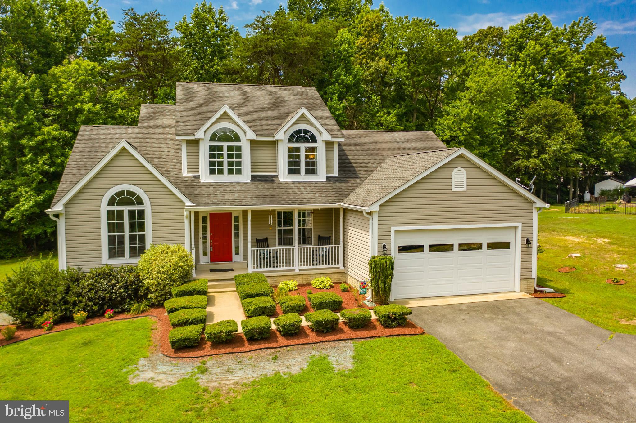 This is a Remarkable 3 Level, 4 Bedroom, 2 1/2 Bath, 2-Car Garage Home Situated on a Quiet Cul-de-Sac.   Plenty of Well-Appointed Space in this Home.  Livingroom and Office/Den are right off the 2-Level Foyer.  The Livingroom opens to the Formal Dining Room.  Eat-In Kitchen has Plenty of Counter Space, and a Pantry for added Storage.  Hardwood Floors and a  Gas Fireplace Compliment the Large Family Room.  Main Level Master Bedroom with Walk-In Closet and Beautiful Ensuite Bath with Dual Vanity, Soaking Tub and a Separate Shower.  Upstairs are 3 more Nicely Sized Bedrooms and a Hall Bath.  Basement is Walk-Out, Unfinished, and has Rough-In for a Bath.  The Large Deck is Partially Screened with Electric and a Ceiling Fan to Enjoy Nature and Entertain.