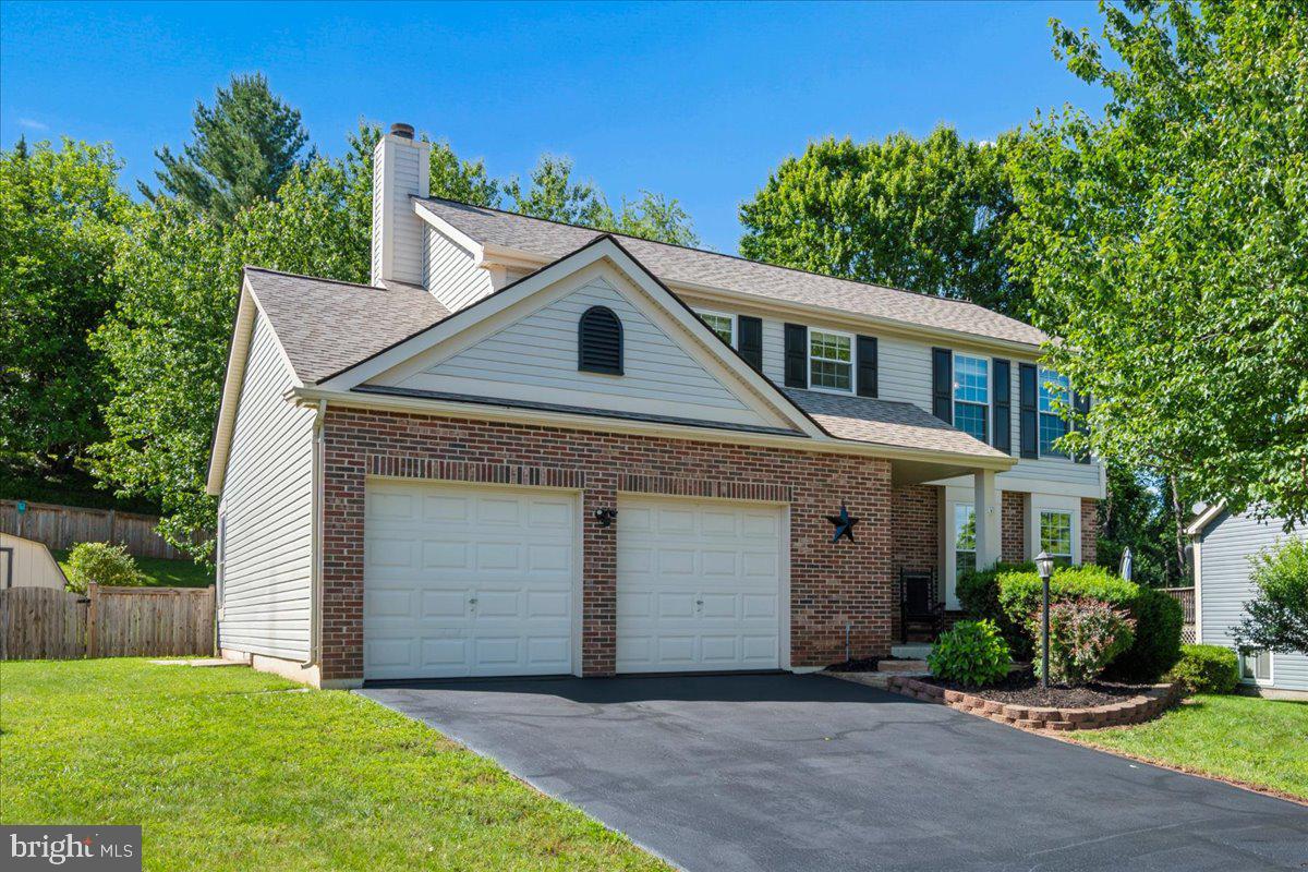 Discover the perfect blend of classic charm and modern comfort in this beautifully maintained 4 bedroom, 2.5 bath Colonial designed for everyday living and effortless entertaining. Newly refinished hardwood floors add warmth and character throughout the main level, while the spacious floor plan offers room to gather, entertain, and relax. The eat-in kitchen features granite countertops, a tile backsplash, stainless steel appliances, and abundant space for casual meals and conversation. Just off the kitchen, the inviting family room has a wood-burning fireplace, creating the perfect place to unwind on cool evenings. Formal living and dining rooms provide elegant spaces for holiday celebrations, entertaining guests, or quiet evenings at home. The finished lower level expands your living space with a large recreation room that is ideal for movie nights, a home gym, hobbies, or a playroom. The basement also includes a generous storage area with built-in shelving, a utility room, and a rough-in for a future bathroom. Step outside to the spacious three-season screened porch overlooking the fully fenced backyard, an ideal setting for morning coffee, outdoor dining, or relaxing with family and friends. An attached two-car garage and storage shed provide excellent space for vehicles, tools, and outdoor equipment. Recent updates include a new roof and siding (2019), double-hung replacement windows, new carpeting (2026), refinished hardwood floors, freshly painted living room, primary bath, hall bath, lower-level recreation room (2026), plus an HVAC system installed in 2013. Enjoy the added benefit of no city taxes while remaining just minutes from shopping, dining, parks, schools, commuter routes, and all the conveniences the area has to offer. With generous living spaces, thoughtful updates, and exceptional indoor and outdoor amenities, this home is ready to create lasting memories for its next owners.