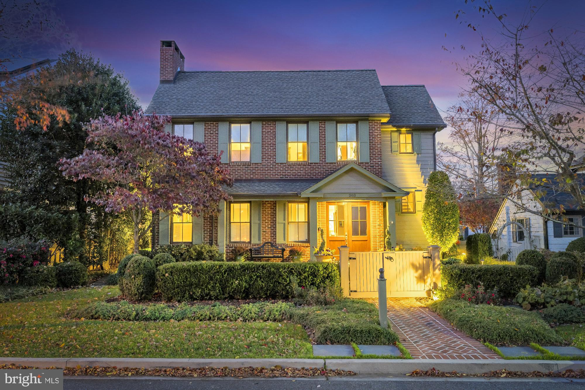 Welcome to 203 E Chew Avenue, a residence of exceptional craftsmanship and refined luxury, originally constructed in 2008 and thoughtfully reimagined through comprehensive renovations completed in 2023 and 2024. Encompassing more than 4,700 +/- square feet of finished living space, with 5 bedrooms, this home offers an elevated blend of sophistication, comfort, and timeless Eastern Shore charm— located on East Chew Street, the property is walking distance to the harbor, boutiques, and celebrated dining of St. Michaels. From the moment you enter, the quality is unmistakable. Clean sightlines and an open, interconnected floor plan create an ideal setting for both everyday living and effortless entertaining. Throughout the home, curated lighting, custom millwork, elegant crown molding, custom doors, and redesigned fireplaces reflect a commitment to thoughtful design and enduring craftsmanship.
The main level features a primary suite with beautifully updated finishes and refined details, including a fully renovated primary bath. There is a second primary suite on the second level as well with a renovated bath. The main residence offers four ensuite bedrooms; all baths have been renovated each providing privacy and comfort for family and guests alike. A standout feature of the property is the fully independent renovated permitted apartment above the two-car heated garage. Complete with a full kitchen, bath, washer and dryer, office area, and sleeping loft, this versatile space is ideal for extended family, guests, a private studio, home office or potential rental income. At the heart of the home, with secure access to the main house from a two garage, providing off street parking and easy kitchen access, is both functional and thoughtful. The kitchen showcases high-end appliances with gas, exquisite finishes, and custom lighting. The kitchen flows seamlessly into the living and dining areas, where fireplaces add warmth and ambiance.
Upstairs, an additional media lounge area, a second upper-level primary suite offers a serene retreat with updated bathroom cabinetry and fixtures, a fireplace, and a beautifully designed custom walk-in closet. A third en-suite bedroom along with a spacious laundry room adjacent to the media room, enhance convenience. The fourth en-suite bedroom is on the third level with additional living space and a renovated bathroom. Outside, professionally newly designed landscaping and a full irrigation system provide year-round beauty, while the blue slate terrace—framed by expertly trained David Austin climbing roses—a grilling area creates a private outdoor sanctuary for entertaining or quiet reflection. Modern conveniences include Wi-Fi broadband, advanced home monitoring systems, and a Hikvision doorbell with remote access, updated HVAC, Renaldi tankless hot water systems both add comfort and peace of mind. A concrete crawlspace with a dehumidification unit is part of this well-built home.  Perfectly positioned near the waterfront and within easy reach of Easton and Oxford, this turnkey home is ideal as a full-time residence or a sophisticated weekend retreat. With flawless finishes, flexible living spaces, and an unrivaled location, this property represents the pinnacle of Eastern Shore living. Schedule your private showing and experience its exceptional character firsthand.  On a price per sq. ft. basis this property represents an excellent value and the new two-level apartment above the heated garage is an exceptional rental investment opportunity, guest quarters, studio or office.