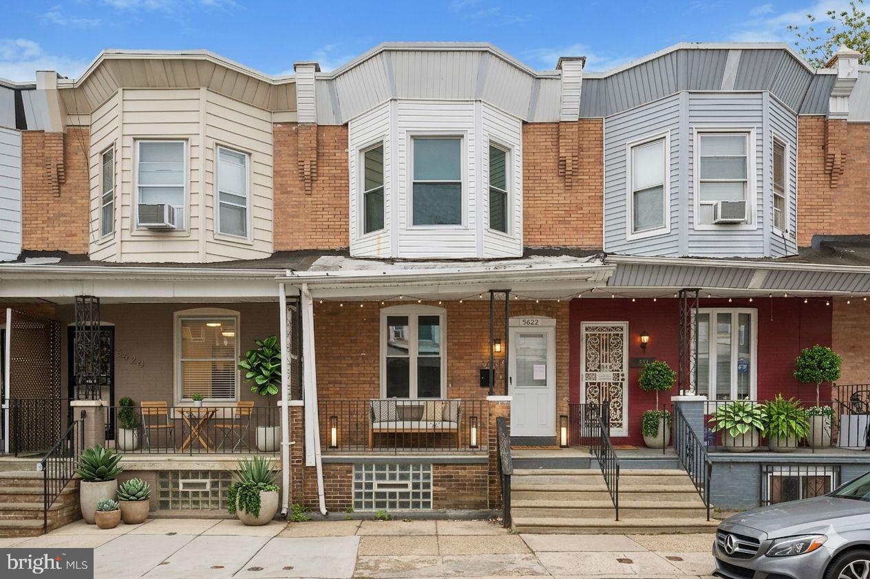 Welcome to 5622 Walton Street — a beautifully renovated home in the heart of Philadelphia’s Cobbs Creek neighborhood, offering the perfect blend of modern updates and everyday comfort.

From the moment you arrive, you’ll appreciate the inviting front porch — ideal for morning coffee or unwinding in the evening. Step inside to a bright, open-concept first floor featuring a seamless flow between the living room, dining area, and kitchen. The fully updated kitchen is a standout, complete with brand-new cabinetry, sleek countertops, stainless steel appliances, and a convenient breakfast bar—perfect for casual dining or entertaining.

Out back, enjoy your private rear yard, a great space for three-season entertaining, grilling, or simply relaxing outdoors.

Upstairs, you’ll find three generously sized bedrooms, including a comfortable primary bedroom, along with two additional guest rooms—perfect for family, visitors, or a home office. The hall bathroom has been completely renovated with modern finishes and thoughtful design.

Whether you’re a first-time buyer or looking to add to your portfolio, this home checks all the boxes. Plus, numerous first-time homebuyer grant programs may be available, making homeownership even more attainable.

Conveniently located near public transportation, parks, and local amenities, 5622 Walton Street offers both value and lifestyle.

Schedule your showing today and see everything this move-in-ready home has to offer.   Some images may be virtually staged.