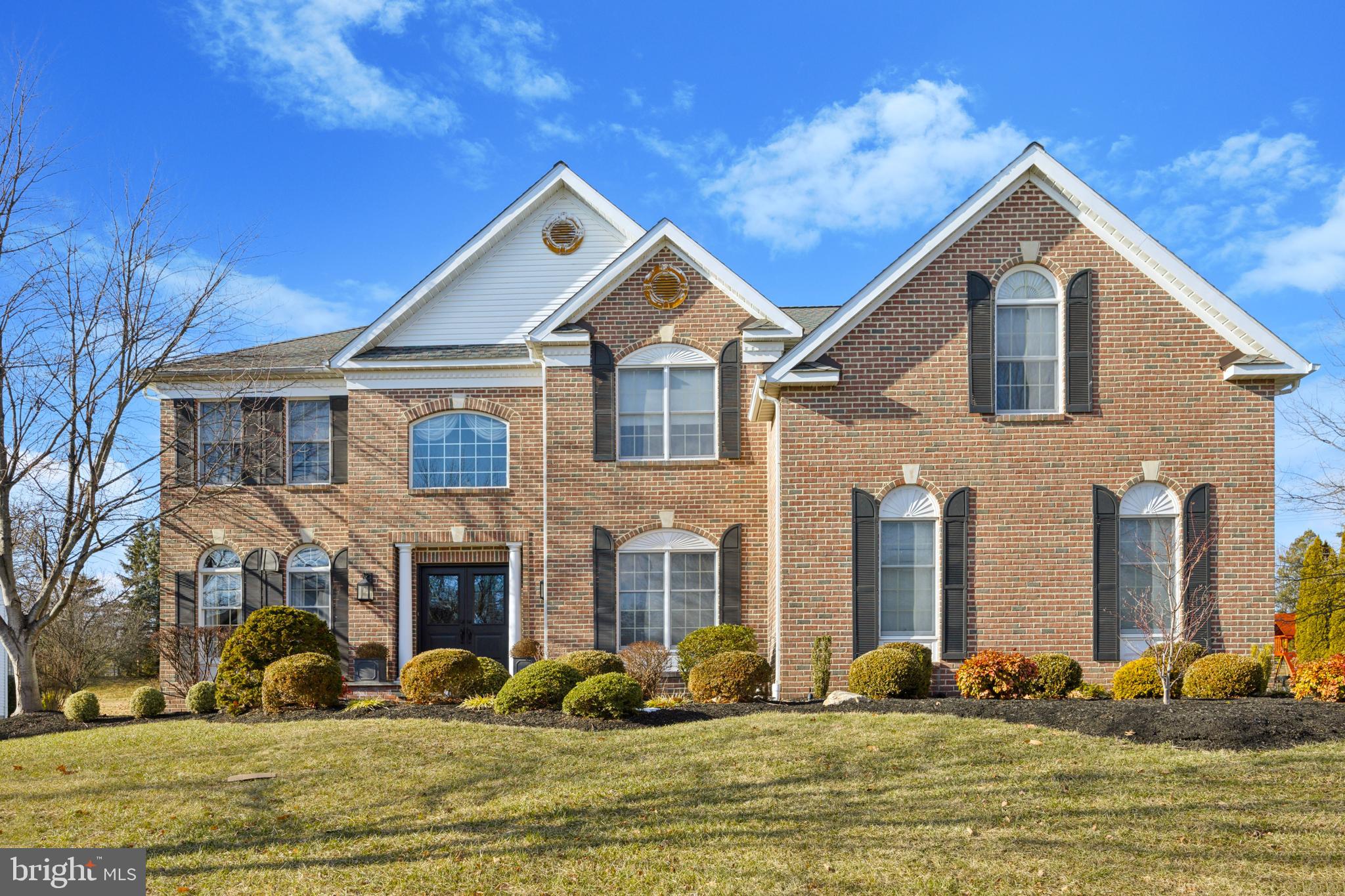 HERE'S WHAT YOU'VE BEEN WAITING FOR  … Discover unparalleled luxury and leisure in this upscale 4-bedroom, 4 ½ bath home nestled in the prestigious and sought-after gated community of Blue Bell Country Club. From the moment you walk up the handsome paver walkway flanked by thoughtful landscaping, you enter the front door and into the grand 2-story entrance foyer where you are captivated by the elegance and functionality of this residence. The main level has handsome hardwood floors and features a formal living room which is open to the dining room, each with beautiful crown moldings and chair rails for a touch of timeless sophistication. The gourmet kitchen boasts a handsome tile backsplash, large center island and a separate breakfast area – perfect for casual meals. The family room is open to the kitchen and has soaring two-story ceilings and is bathed with natural sunlight. It boasts a wood burning fireplace with stacked stone surround and a rustic mantle made from a railroad tie. The open floor plan makes this home ideal for entertaining. In addition, there’s a private home office  and a separate bonus/hobby room or possible 5th bedroom also with new carpets. A powder room with a new vanity in January and 1 month old completely renovated laundry room is conveniently located on this floor. There’s a front and rear staircase which provides easy access throughout this home. The side-entry garage adds both convenience and curb appeal. 

The second level is a retreat unto itself. It boasts a luxurious master suite with a tray ceiling, recessed lights and crown molding. There’s a spacious sitting room and 2 spectacular custom walk-in closets. A newly remodeled spa inspired master bathroom has a corner soaking tub and separate stall shower complete with a rainforest showerhead and a bench. It is simply gorgeous.  There are 3 additional bedrooms, two bedrooms share a Jack-and-Jill bathroom and a fourth bedroom with its own en-suite bathroom.

The lower level is a one-of-a-kind masterpiece like nothing you’ve seen before! It is truly an entertainer’s dream! This fabulous space features heavy timber columns, a custom bar complete with a sink, dishwasher, icemaker and fridge. Thoughtful accent lighting creates an ambience like no other. There’s a cozy TV area with a raised, stacked, stone gas fireplace featuring 4 built-in shelves. This special space, complete with Sonos system,  is perfect for movie nights or cheering on your Philly sports teams. It also offers a home gym, a spa-like bathroom with a dual flush toilet, semi-frameless shower enclosure, vessel sink and tile floor. 

But wait – there’s more, step outside through the kitchen sliders onto an expansive paver patio, complete with a knee wall overlooking the private ½ acre back yard. It’s perfect for entertaining, bar-b-ques or simply relaxing and enjoying a quiet evening. Nestled within the vibrant Willowbend community, residents enjoy access to unparalleled amenities such as an Arnold Palmer-designed golf course, pickleball and tennis courts, basketball courts, a fitness center, swimming pools, and scenic walking and jogging trails – all which ensure a lifestyle of leisure and enjoyment. This home is in the highly ranked and award-winning Wissahickon School District.  Additionally, the area is home to several prestigious private schools, offering families a variety of educational options. It’s conveniently close to top-rated restaurants, boutiques, shops, entertainment, parks and recreation facilities. Offering a lifestyle of comfort, recreation, and convenience – don’t miss the chance to make this home yours. Great home, great price, great location, location, location! Hurry with your strong offers, this gem won't last!