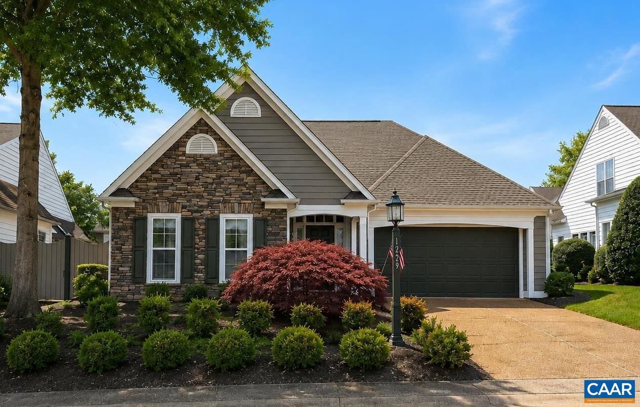 Open House Sunday 7/19 1-4 Located in the desirable Stonegate community in Crozet, this charming one-level home offers easy living with exterior and yard maintenance included through the HOA. With just over 1,600 finished square feet, the home features an inviting and functional layout filled with natural light. The living room is anchored by a cozy gas fireplace, while skylights add brightness and warmth to the main living areas. The home also offers a wonderful 12x12 screened porch, providing a private outdoor retreat perfect for morning coffee or relaxing evenings. Recent improvements include a new roof and newer windows, offering peace of mind for the next owner.  Stonegate residents enjoy a quiet setting with detached homes while being just minutes from downtown Crozet, local shops, restaurants, breweries, parks, and trails. Owners also have the option to join nearby Western Ridge amenities, including a pool, clubhouse, fitness room, and sports courts.,Fireplace in Living Room