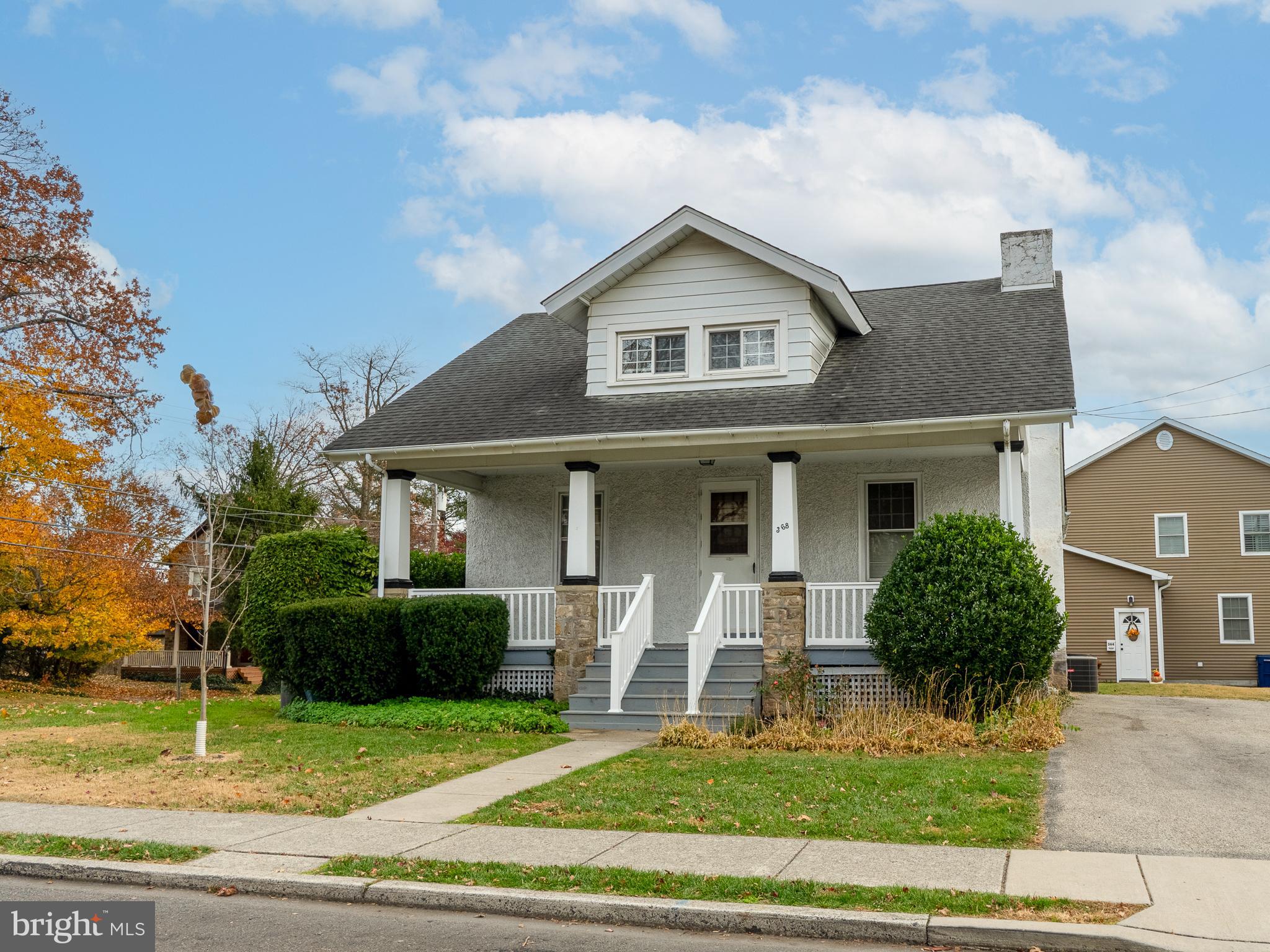 This spacious 4 Bedroom 2 full bath Cape Cod is located in Wissahickon School District section of Boro of Ambler.  It is just 1 block from Butler Pike and within easy walking distance to Ambler restaurants and entertainment along with public transportation and all Wissahickon schools. The home has been recently renovated and features central air, updated kitchen and bathrooms, hardwood floors along with a freshly painted interior. This bungalow offers an over-sized, covered front porch, large living room w/ brick woodburning fireplace, nice size dining room, eat-in-kitchen  with new flooring and access to back yard.  Two bedrooms, full bath and 9' ceilings complete the first floor. The second floor hosts two additional bedrooms, cedar closet and a full hall bath. Yellow pine hardwood floors throughout, full unfinished basement, modern heating system w/ hot water radiator heat, and central air, basement laundry and amazing storage space.  Come see this before it is gone!