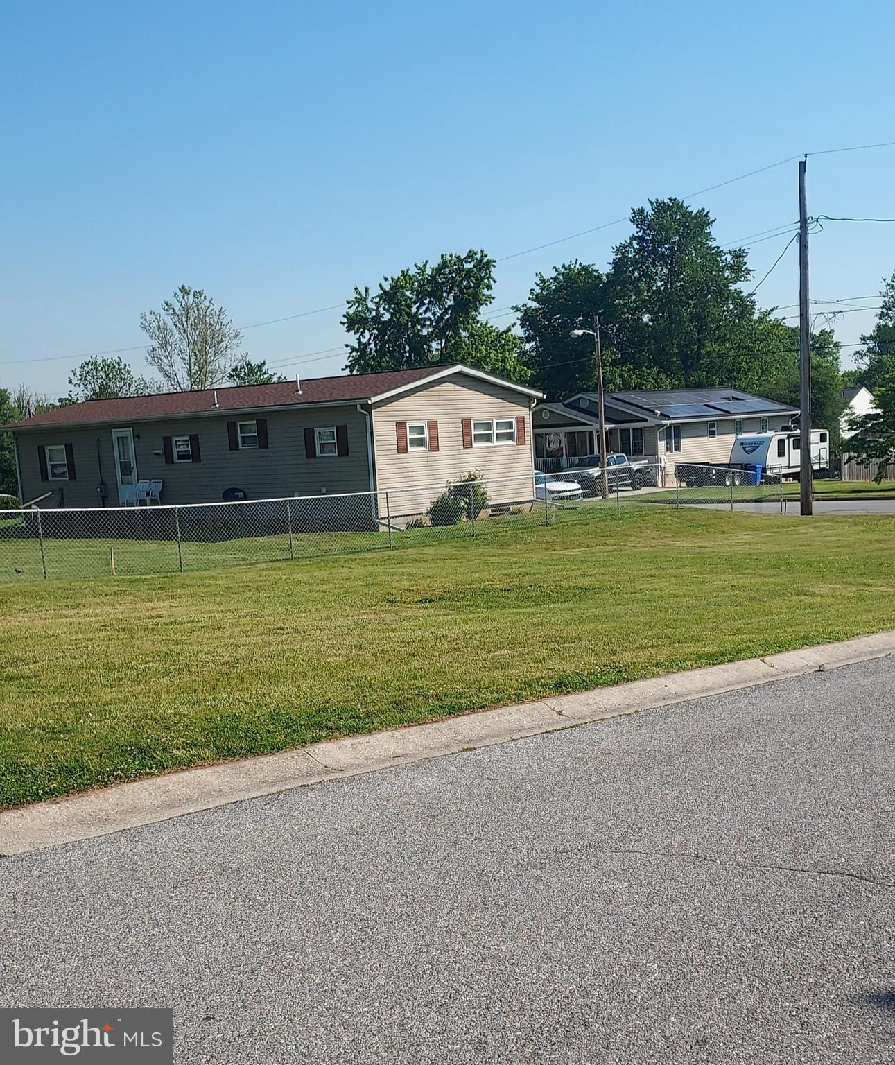 READY TO BUILD YOUR DREAM HOME........This level corner lot in Taneytown is priced to sell.  Beautiful lot which borders on Commerce St and Reaverton Ave.   Water and sewer hookup available.  Preliminary work complete with survey and markers in place.