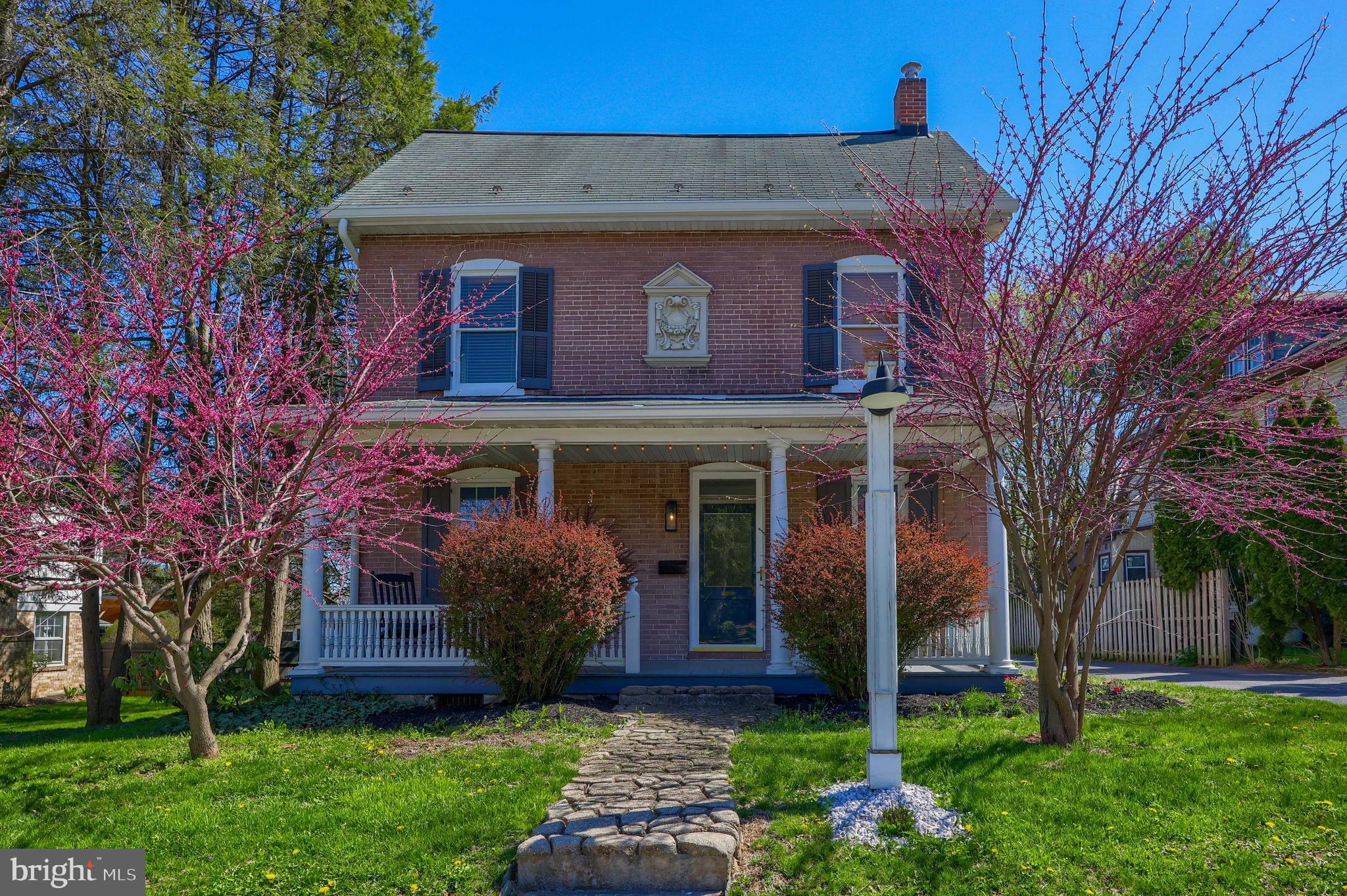 Prime location within close proximity to all Downtown Lititz has to offer: shops, restaurants, parks and more. This stately 2.5 story home has been updated with fresh paint, refinished hardwood floors and new appliance; while retaining its original charm and woodwork. Main floor features 2 large rooms for living and dining, a spacious eat in kitchen with bay window and a family room addition with large patio doors. The second floor hosts 2 bright and spacious bedrooms and a huge bathroom with double vanity, whirlpool tub and tile shower. On the third floor is a spacious suite with a private bath, sitting area, gas stove and walk out balcony. Quiet backyard features a nicely landscaped patio space and fish pond.