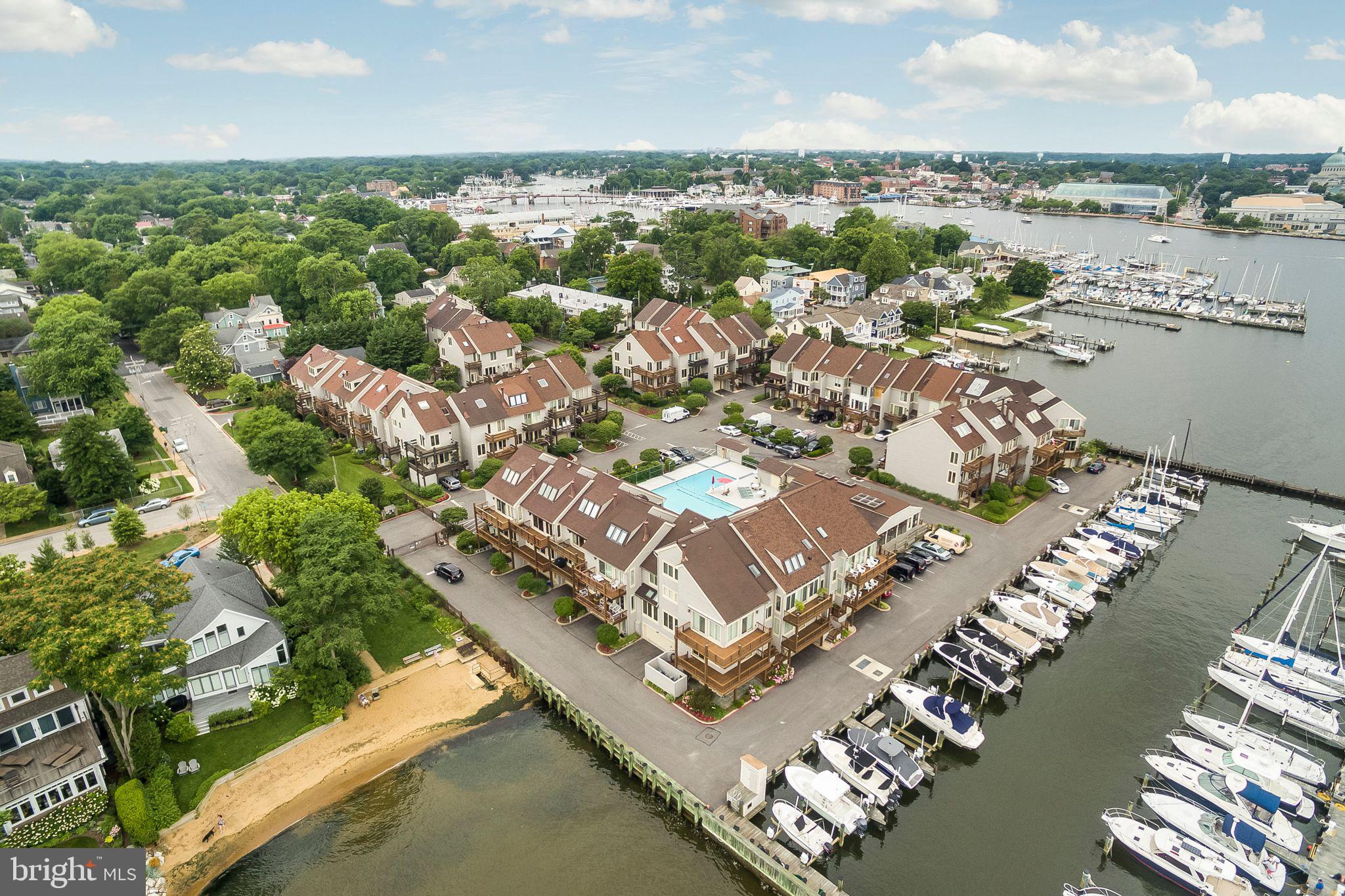 Location, location, location. Sweeping views overlooking the mouth of the Severn Severn River and the Chesapeake Bay are a beautiful compliment to this corner-end unit townhome. Enjoy morning sunrises on your deck.  Chesapeake Landing features 4  wonderful levels of Eastport living...3 spacious bedrooms/3.5 baths.  Loft with high ceilings and three vibrant windows with amazing views perfect for a private office or overflow guests. Main level bedroom and bath that is perfect for guests or your home office. 2 car garage.  Plus elevator. Bright, neutral palette waiting for you to create your own waterfront retreat.  Join Maryland Capitol Yacht Club for pool membership & club. All within a Gated community.  Multiply decks 
 Best location views of the December Eastport  Yacht Club Parade of Lights, Wednesday sailing races, July 4th fireworks, Navy Vessels, and of course the Blue Angels from your decks. Don't miss out on your opportunity to own a rare and magnificent piece of property in the heart of Eastport. Super walking location to 47 fine restaurants and shops. quick water taxi ride to downtown Annapolis. Oh and come fall in love with the sounds of the Bay at your back door...clean palate to remodel as you please.