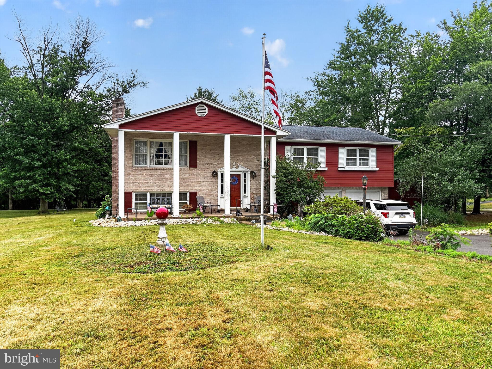 Spacious 5-bedroom, 2.5-bath bi-level home offering 2,536 square feet of living space on a generous .69-acre lot in Trappe Borough and the Perkiomen Valley School District. The upper level features a living room, eat-in kitchen, dining room, three bedrooms, and two full bathrooms. The lower level provides additional living space with a family room, sunroom, two bedrooms, a half bath, and laundry room. Additional features include natural gas heat, central air, public water and sewer, a two-car attached garage, and two storage sheds.  Conveniently located near shopping, schools, parks, and major commuter routes. This property offers substantial living space and is an excellent opportunity for a buyer to make it their own.