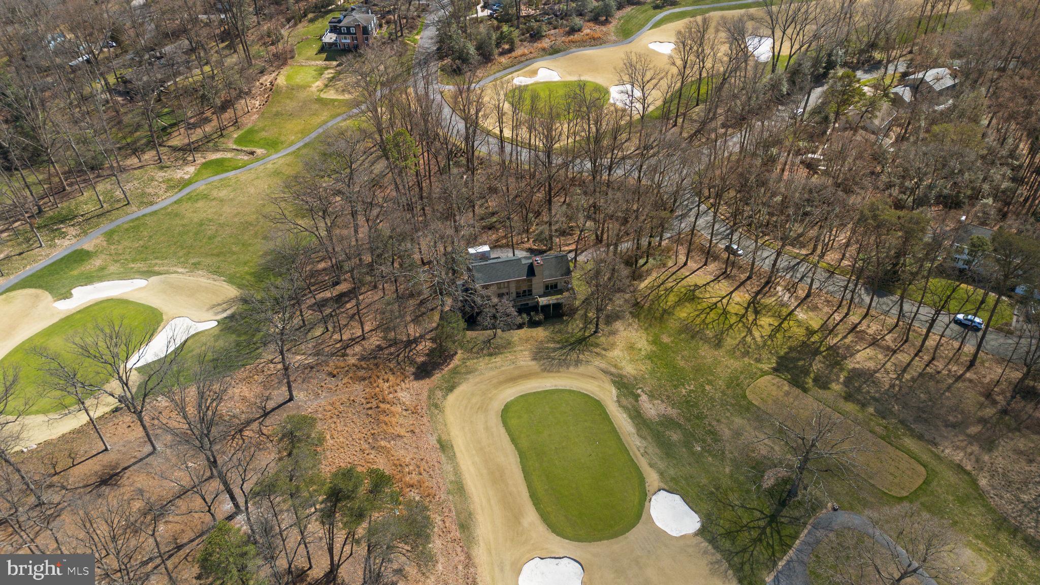 Welcome to this spectacular contemporary residence, idyllically situated on a picturesque half acre lot alongside the 8th green of the renowned Chartwell Country Club in the sought-after community of Chartwell on the Severn. This spacious home offers 3 bedrooms, 3 full bathrooms, and 2 half baths across four levels, with soaring ceilings, expansive windows, and an abundance of natural light throughout. Designed for both comfort and entertaining, the open-concept layout creates a seamless flow between living spaces. The inviting living room is centered around a striking stone fireplace, with an additional fireplace adding warmth and character to the home. Step outside to the deck and patio, where you can unwind and take in peaceful golf course views. The expansive primary suite offers a serene retreat with tranquil vistas and the opportunity to create your dream en-suite. A versatile loft provides an ideal space for guests or a home office complete with breathtaking views and convenient elevator access from the main level. The unfinished basement presents endless possibilities for customization—whether a home theater, gym, or additional living space. Additional highlights include an attached two-car garage and access to the highly desirable amenities of the Chartwell community, including the St. Andrew’s Swim and Tennis Club, the scenic Chartwell Golf Course, and close proximity to shopping, dining, and major commuter routes. This exceptional property offers the perfect blend of elegance, space, and opportunity—schedule your private tour today!